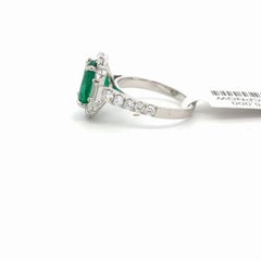 3.17 Carat Emerald and 1.51 Carat Diamond Halo Ring in 18K White Gold