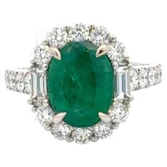 3.17 Carat Emerald and 1.51 Carat Diamond Halo Ring in 18K White Gold