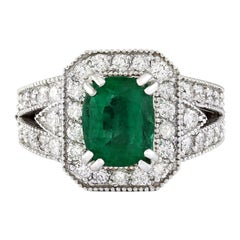 Bague diamant émeraude en or blanc massif 14 carats