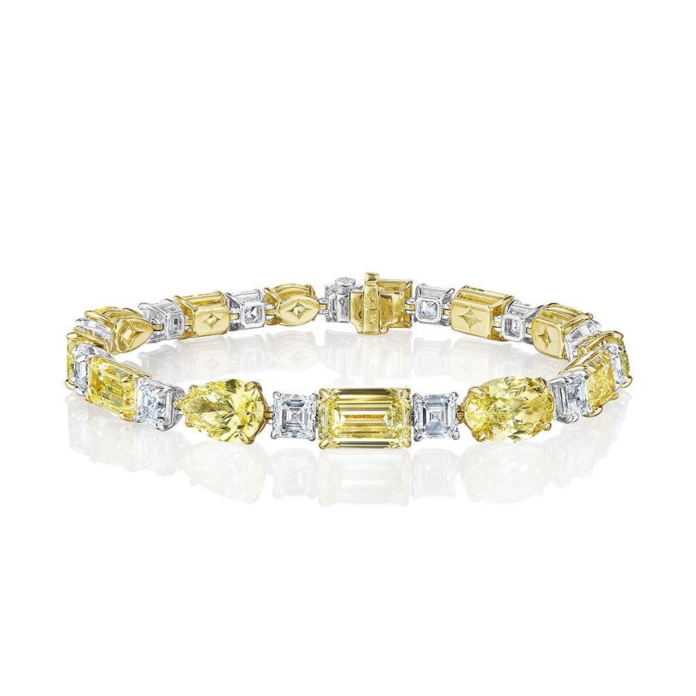 •	Platinum & 18KT Yellow Gold
•	7” Long
•	31.71 Carats

•	Number of Asscher Cut Diamonds: 13
•	Carat Weight: 8.04ctw
•	Color: D-F
•	Clarity: VVS1 – VS2
•	All Diamonds are GIA Certified

•	Number of Yellow Diamonds: 13
•	Carat Weight: