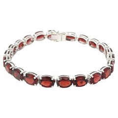 Bracciale tennis impilabile con granato taglio ovale da 31,77 carati per la mamma in argento sterling