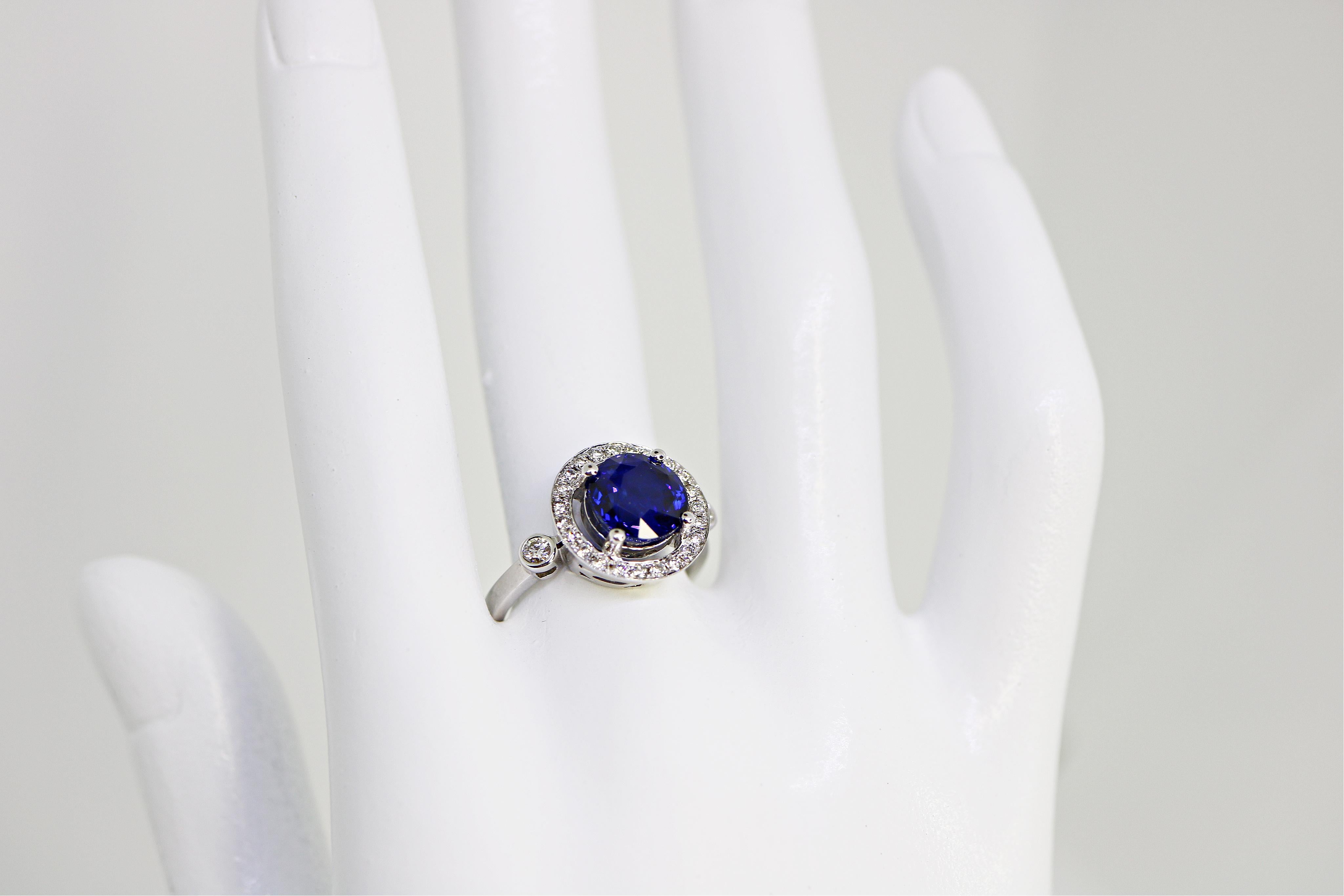 Round Cut 3.17 Carat Round Blue Sapphire and Diamond Ring