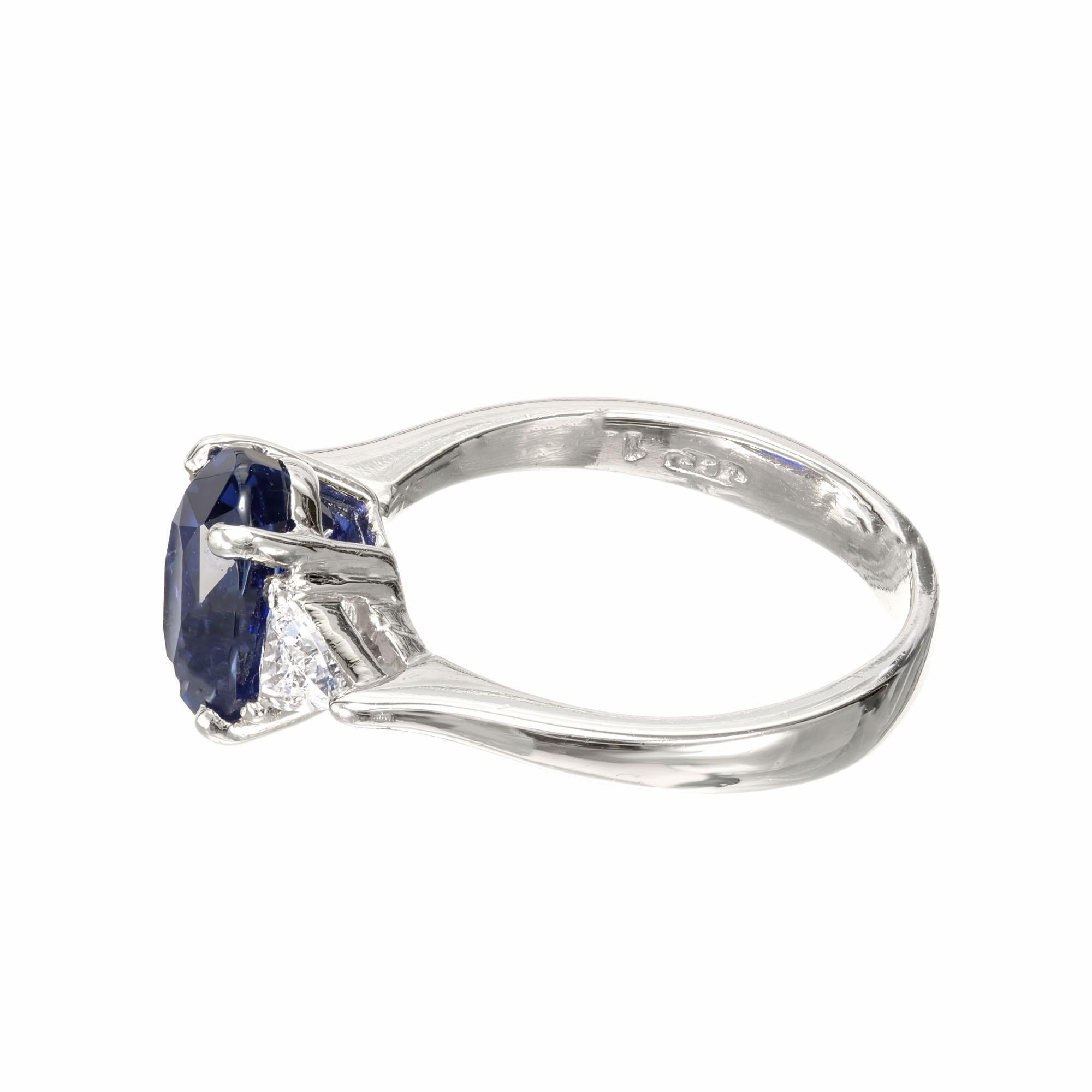 Oval Cut 3.18 Carat Blue Sapphire Diamond Platinum Three-Stone Engagement Ring For Sale