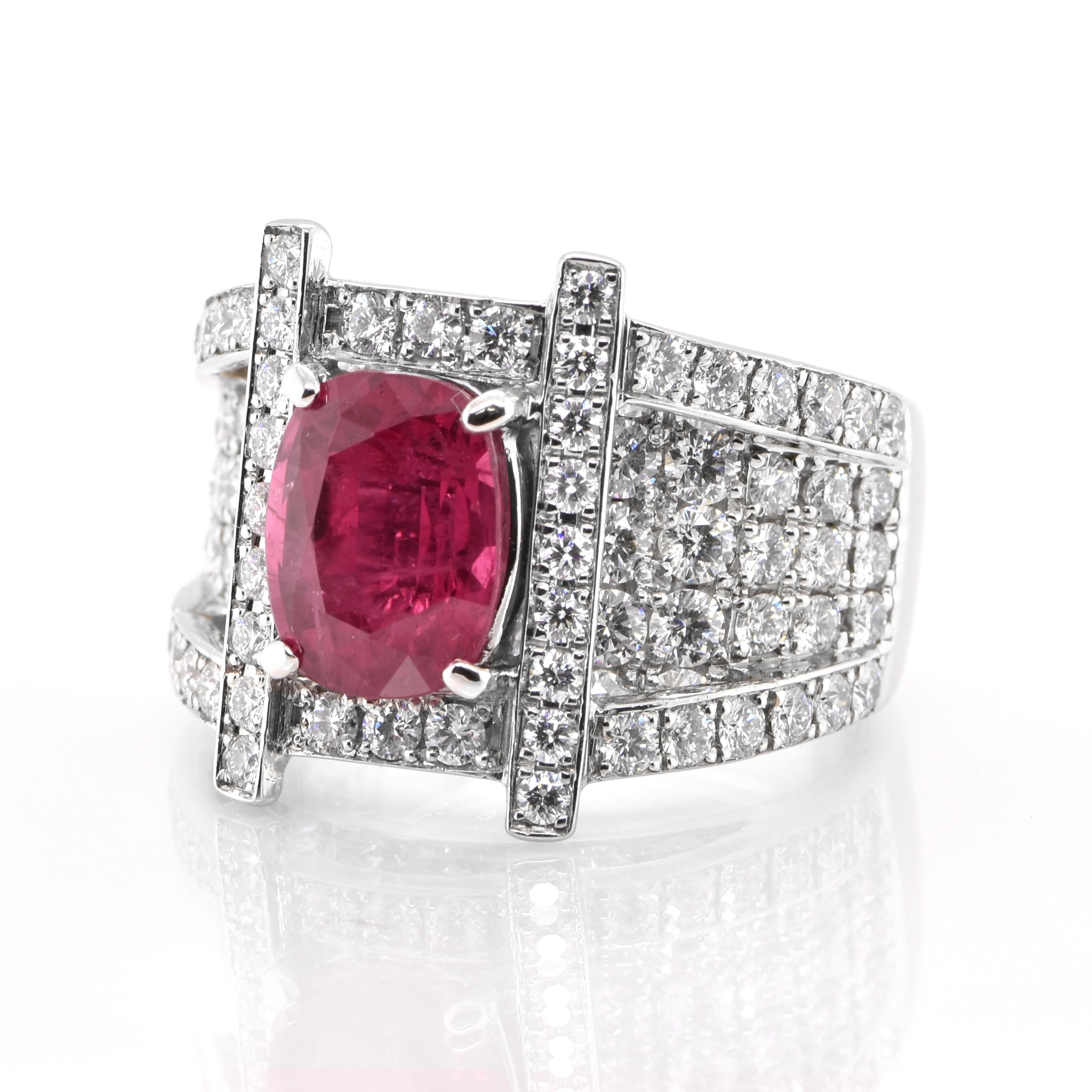 A beautiful Cocktail Ring featuring a GIA Certified 3.18 Carat, Natural, Thailand Mined Ruby and 2.514 Carats of Diamond Accents set in Platinum. The Ruby displays really exceptional luster and color. Rubies are referred to as 