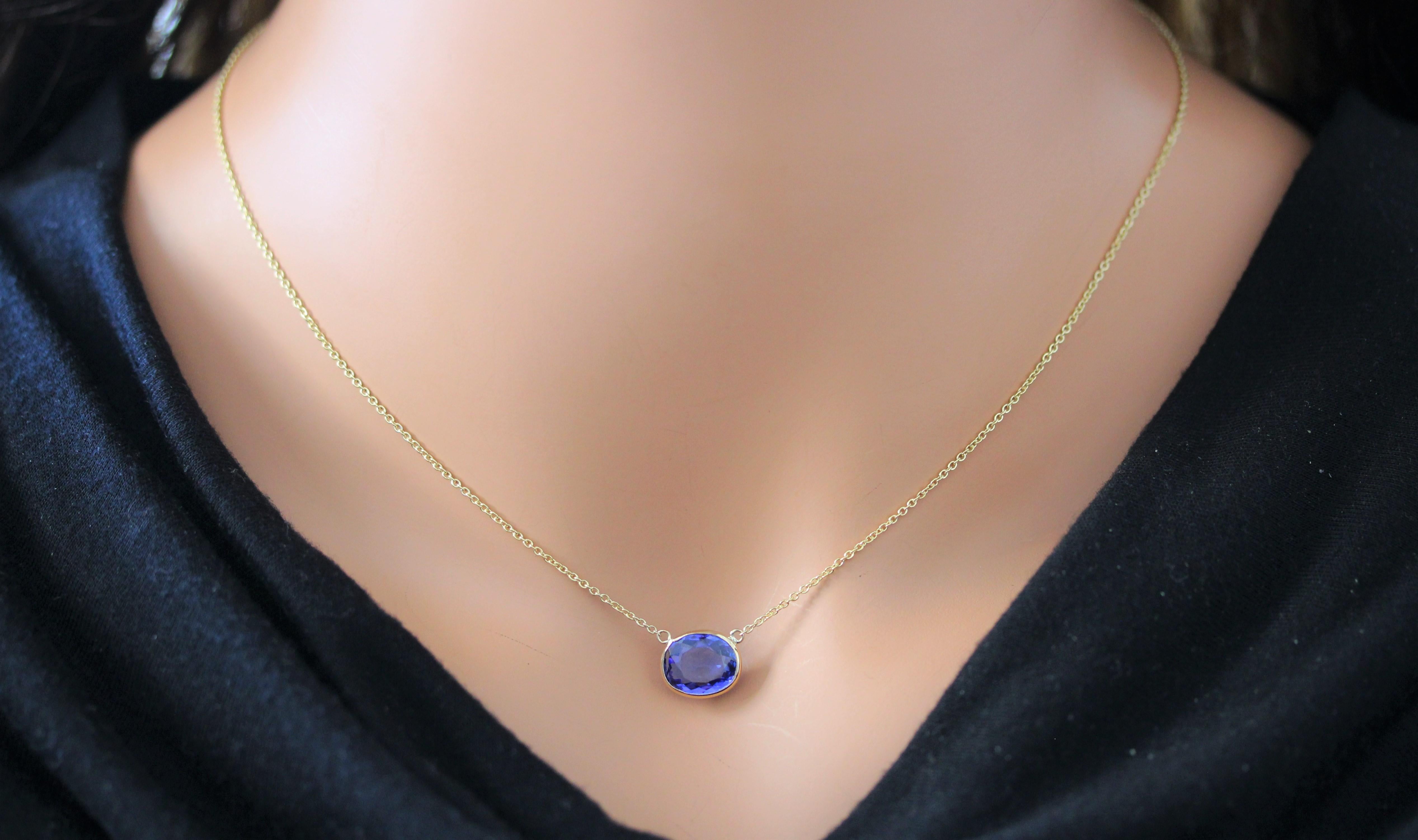 Contemporary 3.18 Carat Oval Tanzanite Blue Fashion Necklaces In 14k Yellow Gold For Sale
