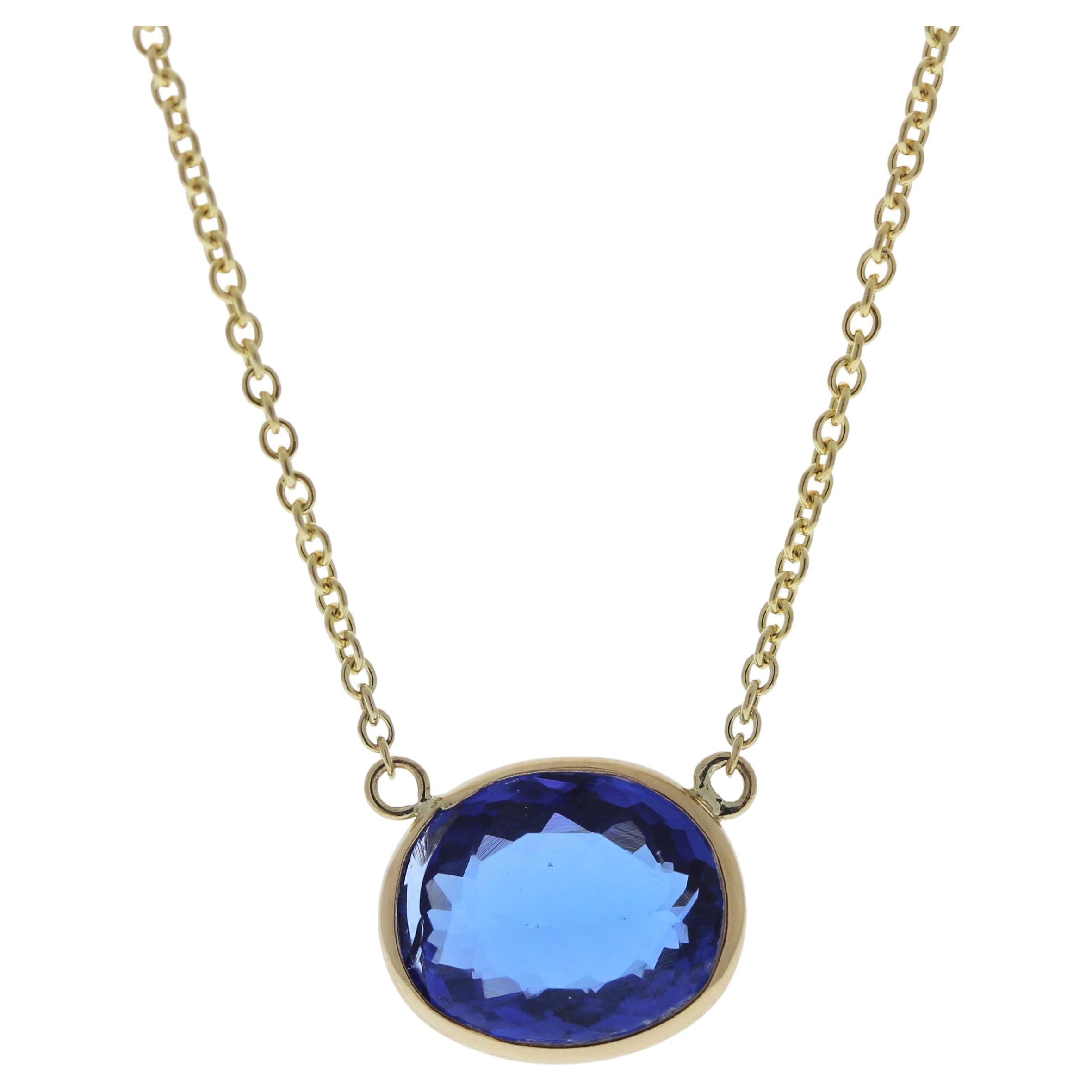 3.18 Carat Oval Tanzanite Blue Fashion Necklaces In 14k Yellow Gold For Sale