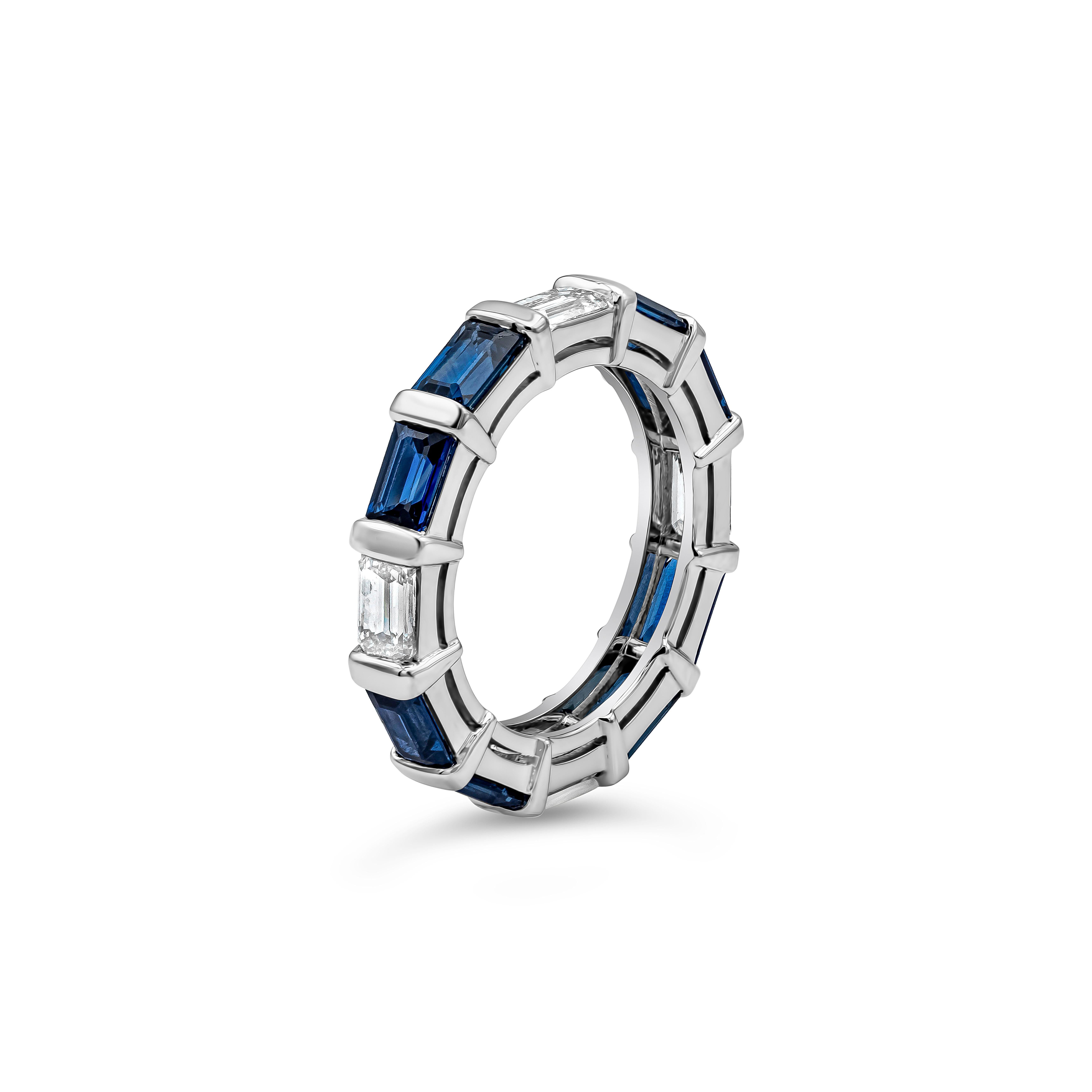 A beautiful and vibrant wedding band style showcasing an 8-piece emerald cut blue sapphires alternating to a 4-piece diamonds mounted in a platinum setting. Sapphires weigh 3.18 carats total; Emerald cut Diamonds weigh 1.25 carats in total and H-I