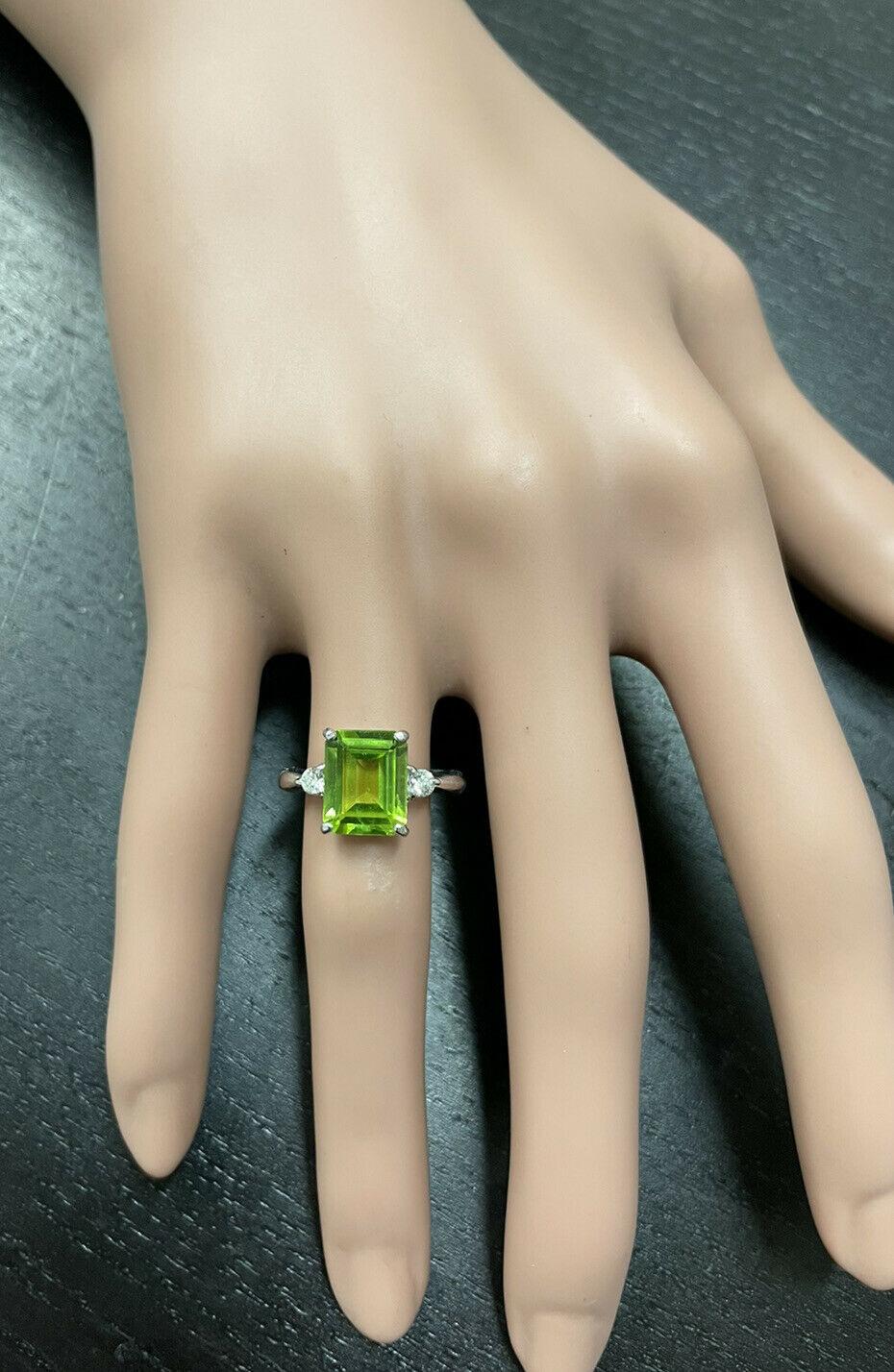 Women's 3.18 Carats Natural Peridot and Diamond 14k Solid White Gold Ring For Sale