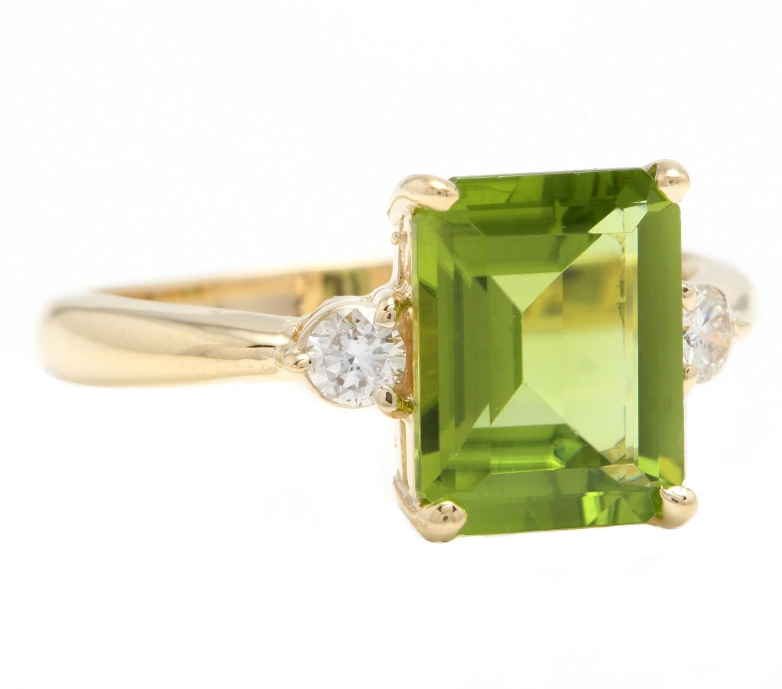 3.18 Carats Natural Very Nice Looking Peridot and Diamond 14K Solid Yellow Gold Ring

Stamped: 14K

Suggested Replacement Value: Approx. $3,500.00

Total Natural Emerald Cut Peridot Weight is: Approx. 3.00 Carats 

Peridot Measures: Approx. 10 x