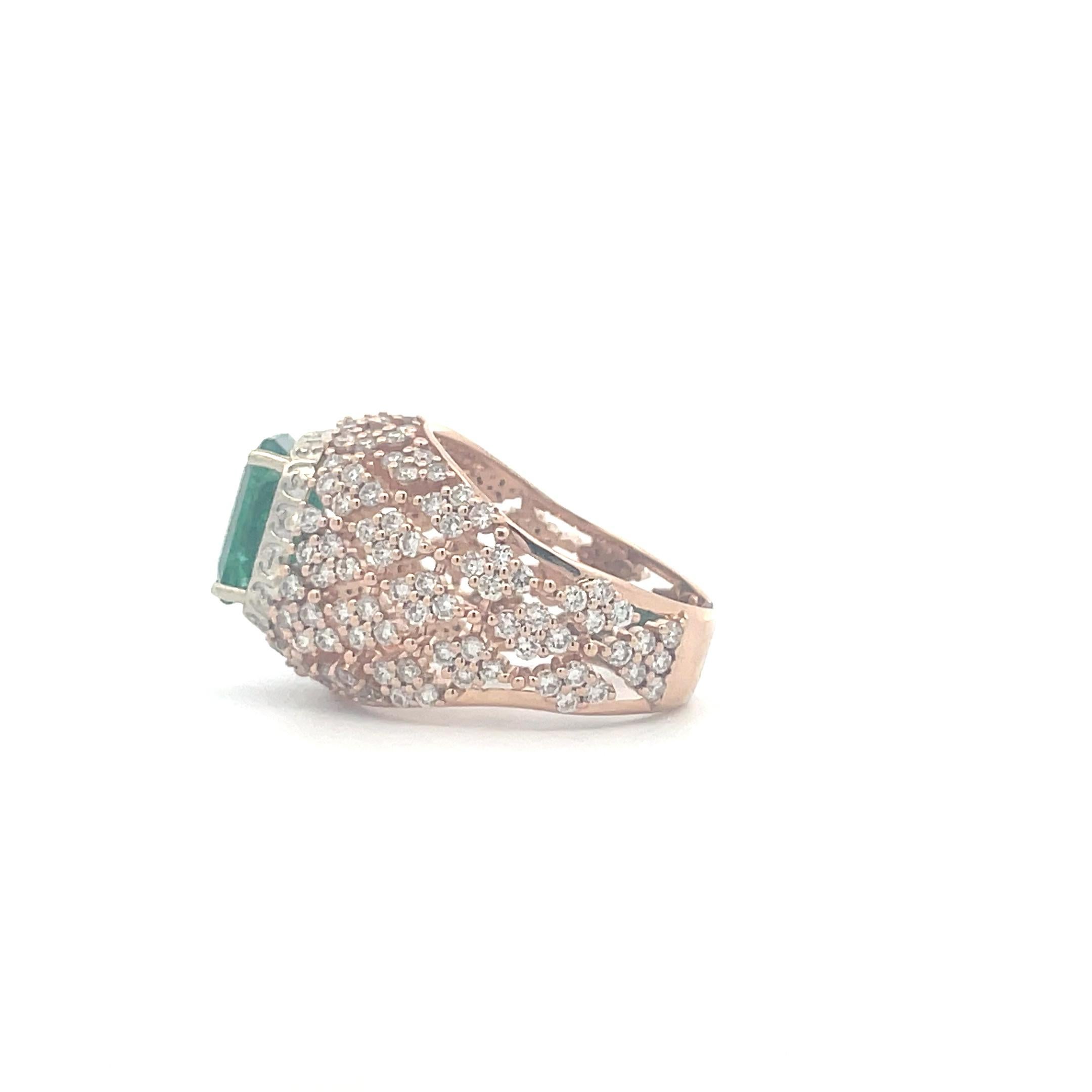 Exquisite and breathtaking, our 3.18 CT Emerald, Diamond Cluster, Hollow Cocktail Statement Ring is a unique design handcrafted by professional artisans. Crafted in 14k yellow gold and rose gold, this statement ring features a beautiful emerald