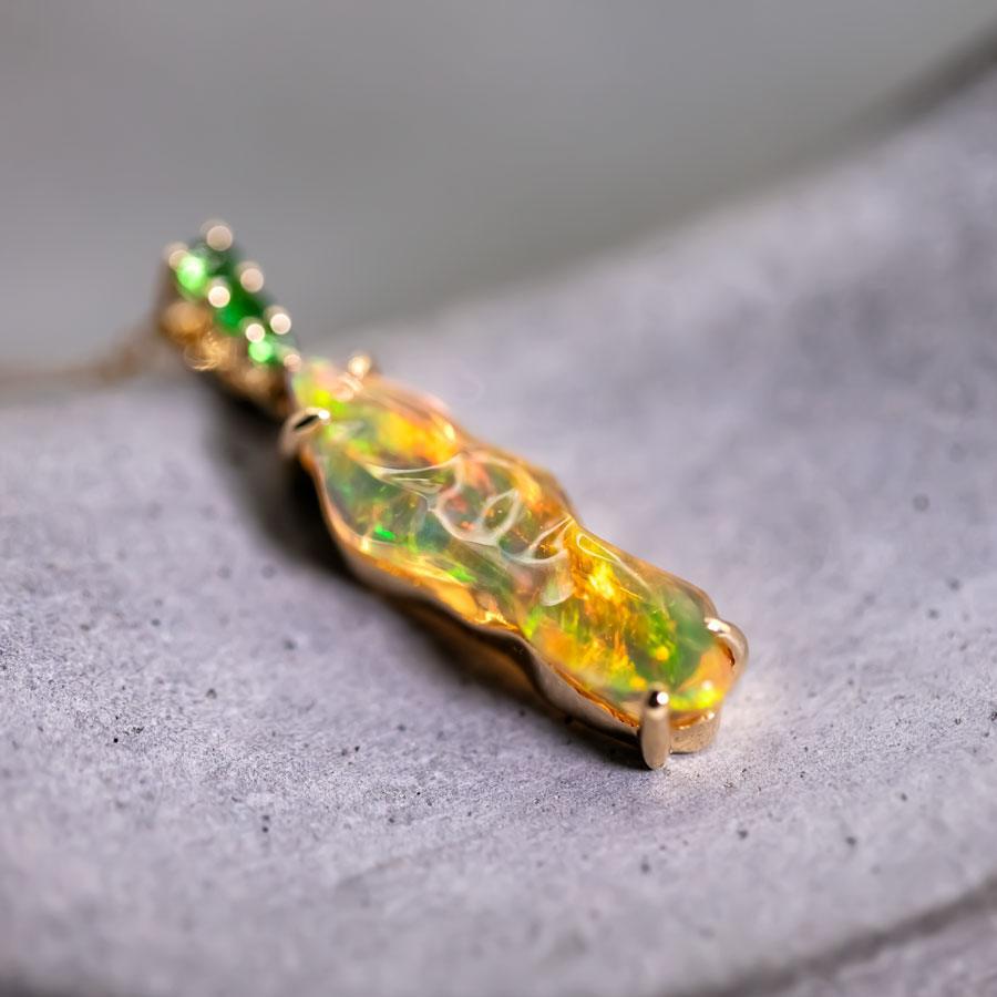 3.18 ct Mexican Fire Opal, Tsavorite Pendant Necklace 18K Yellow Gold.


Free Domestic USPS First Class Shipping! Free Gift Bag or Box with every order!

Opal—the queen of gemstones, is one of the most beautiful gemstones in the world. Every piece