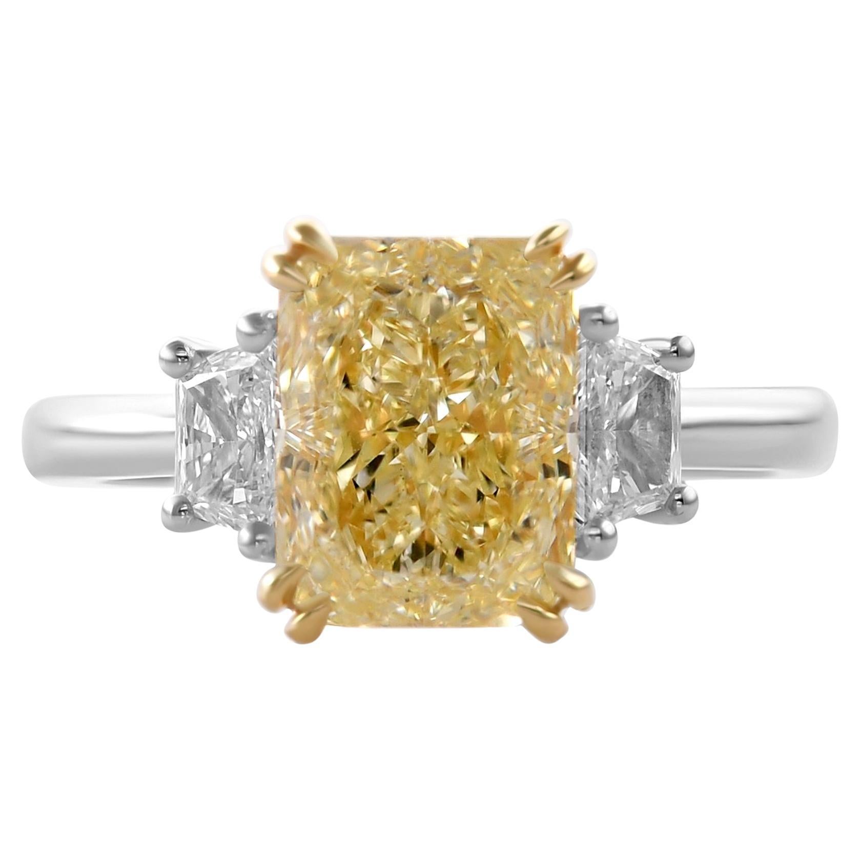 3.18 cts GIA Certified Light Yellow Y-Z Radiant Three-stone Diamond Ring