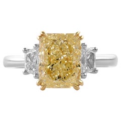 3.18 cts GIA Certified Light Yellow Y-Z Radiant Three-stone Diamond Ring