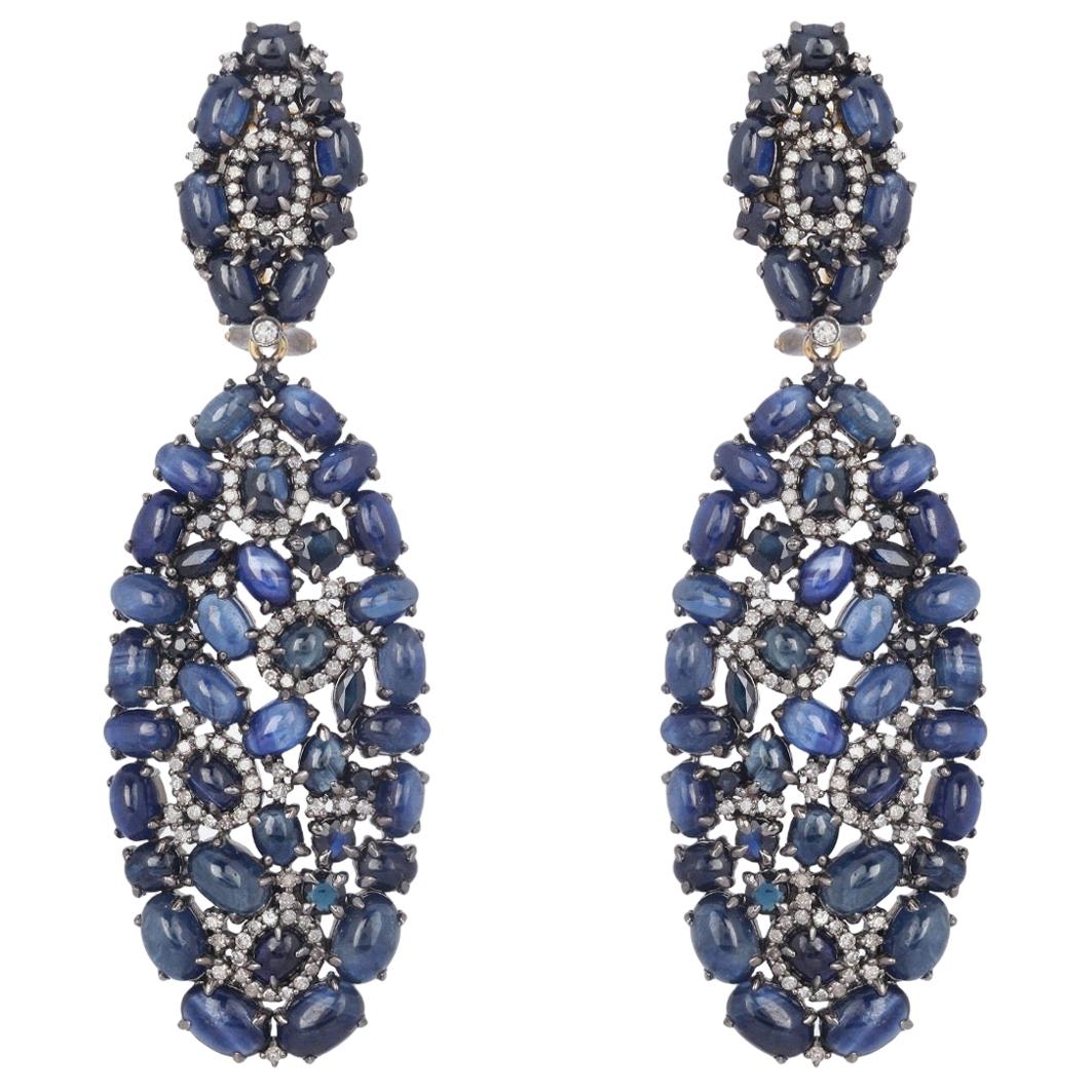Boucles d'oreilles fluides en saphir bleu de 31,86 carats et diamants