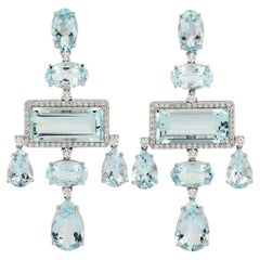 Pendientes de gota de oro de 14 quilates con diamante topacio azul de 31,88 quilates