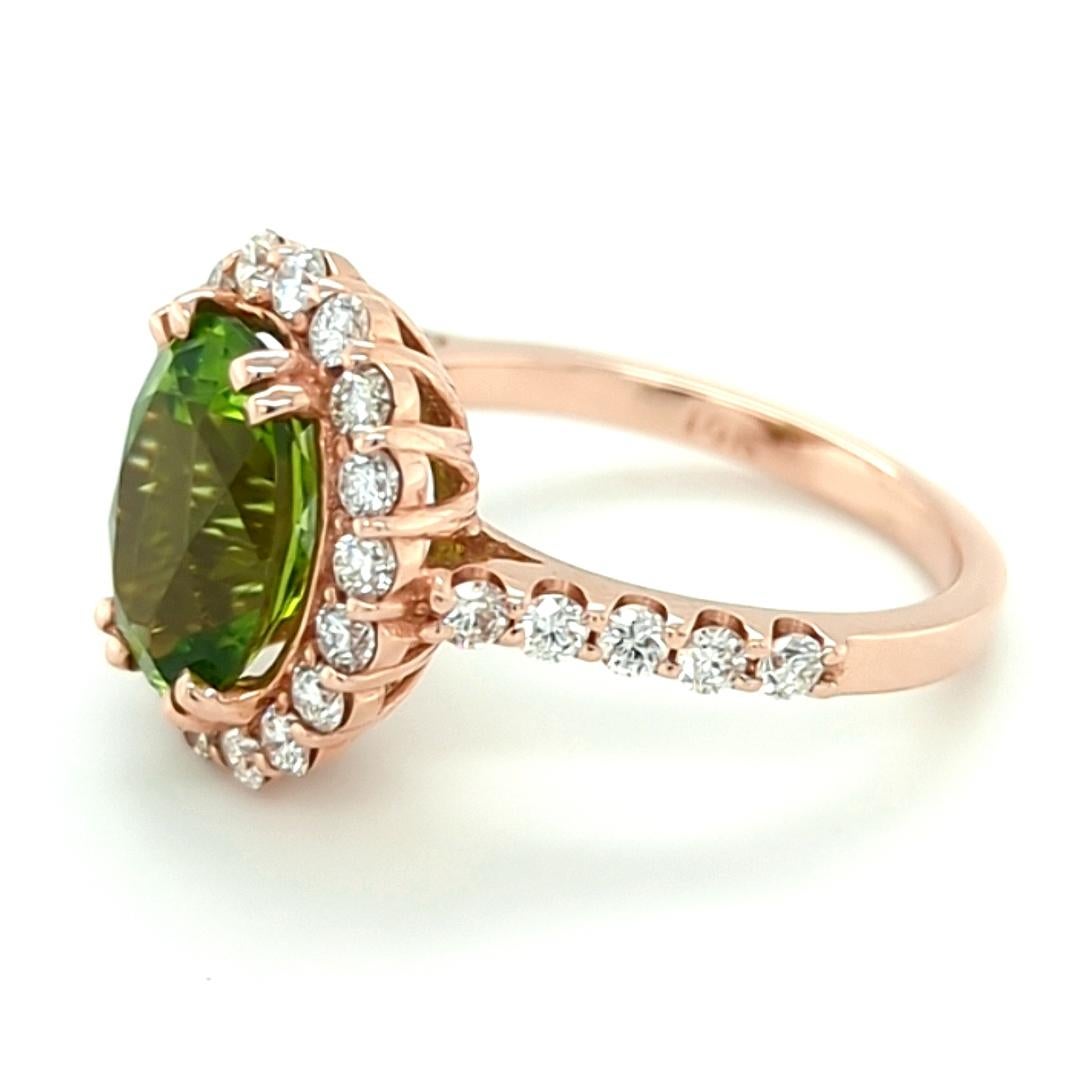 Contemporary 3.18ct Arizona Peridot set in 14kt Halo Ring with 0.83ct of Diamonds For Sale