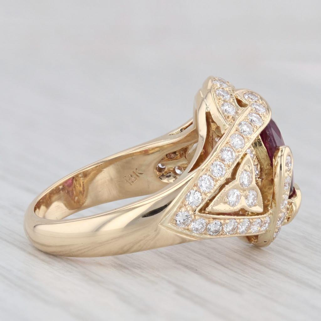 Gemstone Information:
- Natural Ruby -
Carats - 2.20ct (7 x 9 mm) 
Cut - Oval Brilliant
Color - Purple / Red
Treatment - Heated
GIA - 7235171655

- Natural Diamonds -
Total Carats - 0.98ctw
Cut - Round Brilliant
Color - E - G
Clarity - VS2

Metal: