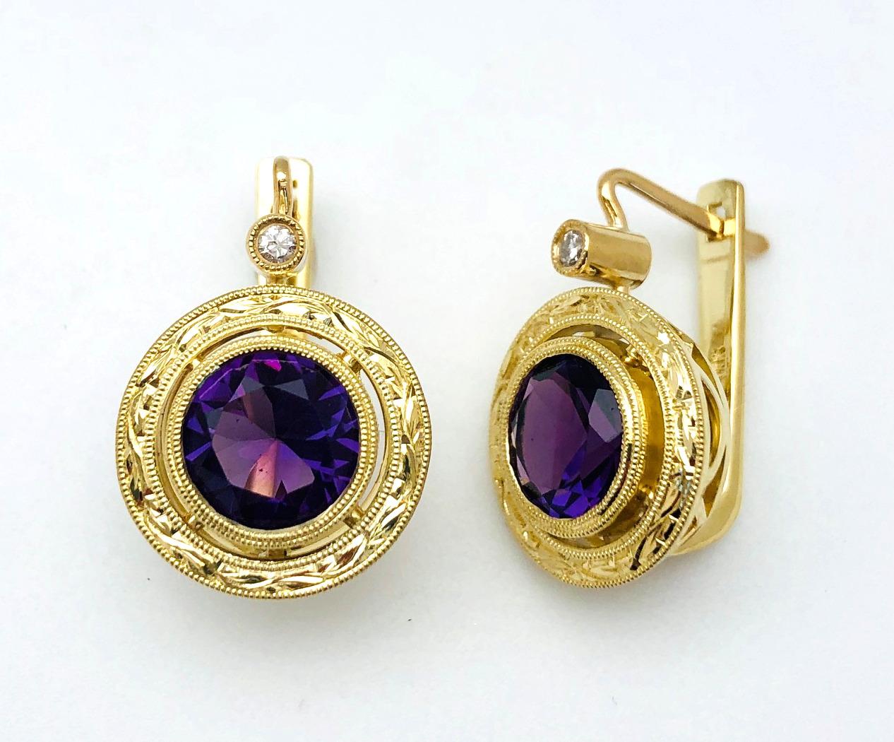 Part of our Day to Night Collection, these 18k yellow gold earrings feature orchid colored amethysts set in beautiful handmade bezels. The double milgrain border and detailed engraving display the exceptional artisanship that is part of our