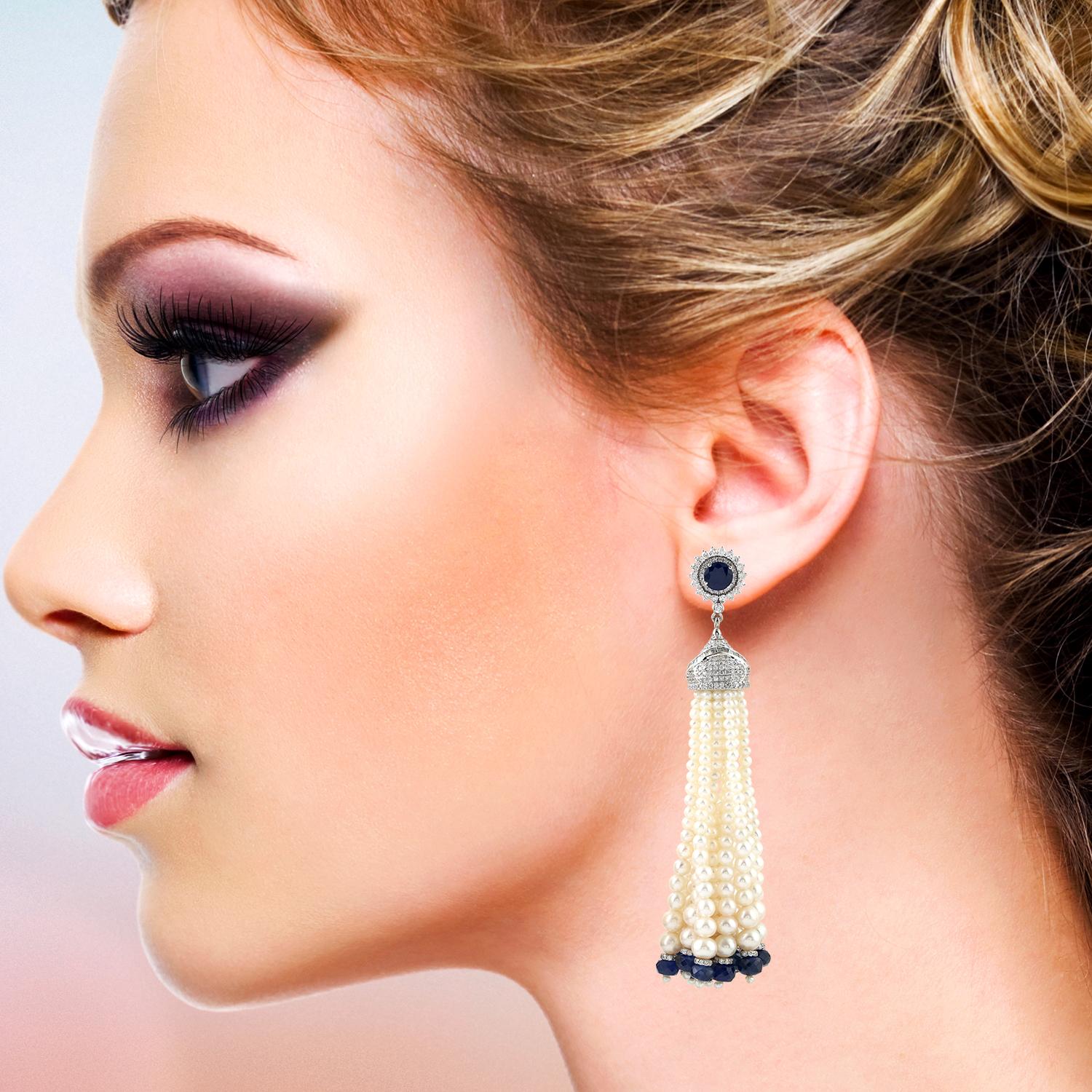 These stunning tassel earrings are handmade in 18-karat gold. It is set in 108.5 carats pearl, 31.9 carats blue sapphire and 4.14 carats of glittering diamonds. 

FOLLOW  MEGHNA JEWELS storefront to view the latest collection & exclusive pieces. 