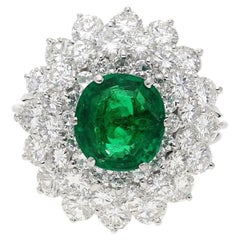 3.19 Carat Oval Cut Emerald Minor Oil & Diamond Cluster Platinum Vintage Ring