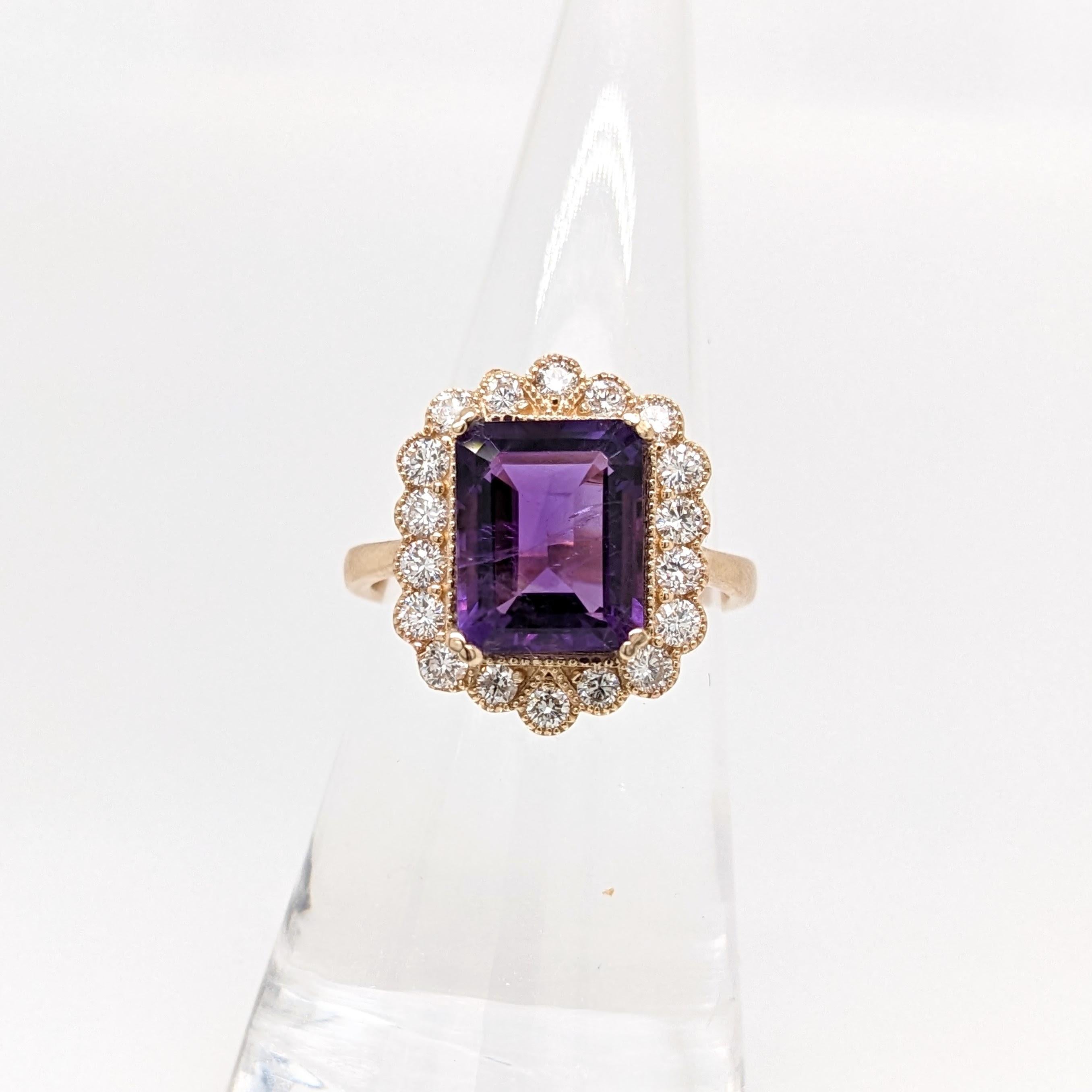 This gorgeous ring features a 3.19 carat emerald cut amethyst and a halo of natural earth mined diamonds with milgrain detail all set in solid 14K gold. This statement ring can be a beautiful february birthstone gift for your loved ones!