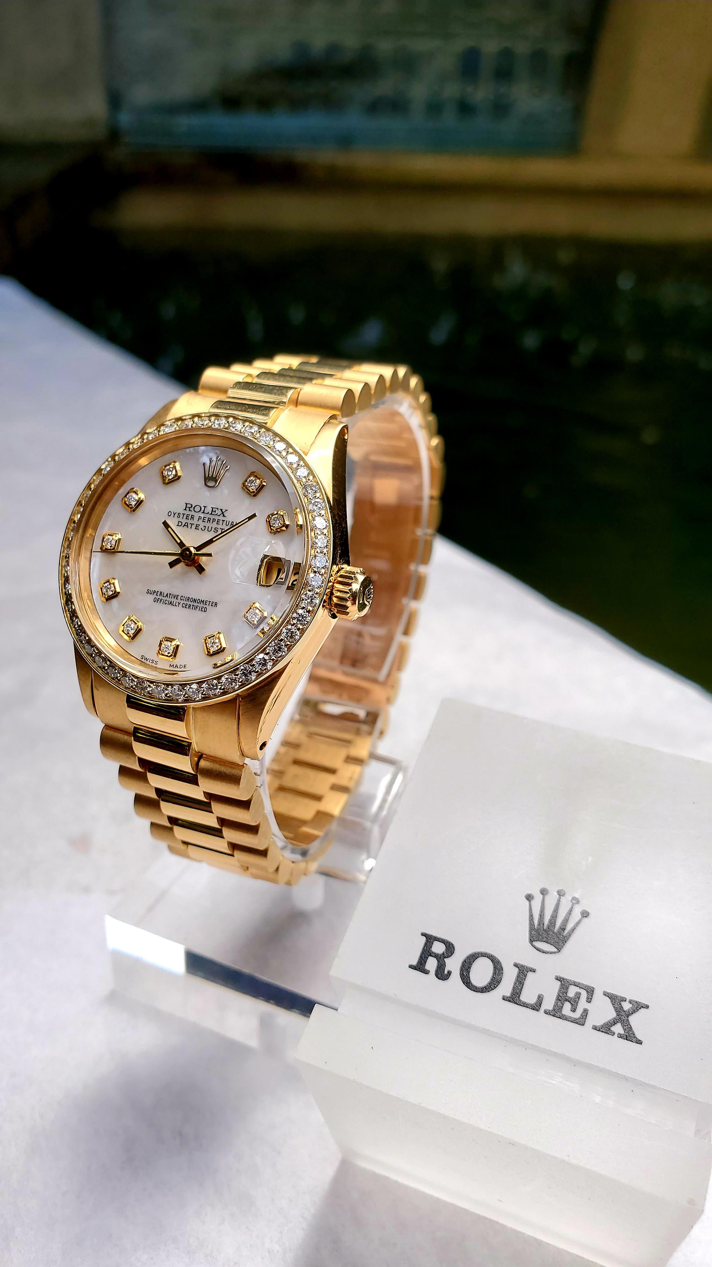 Rolex Midsize Presidential 18 Karat Yellow, Mother of Pearl Diamond Dial, Bezel In Excellent Condition In New Orleans, LA