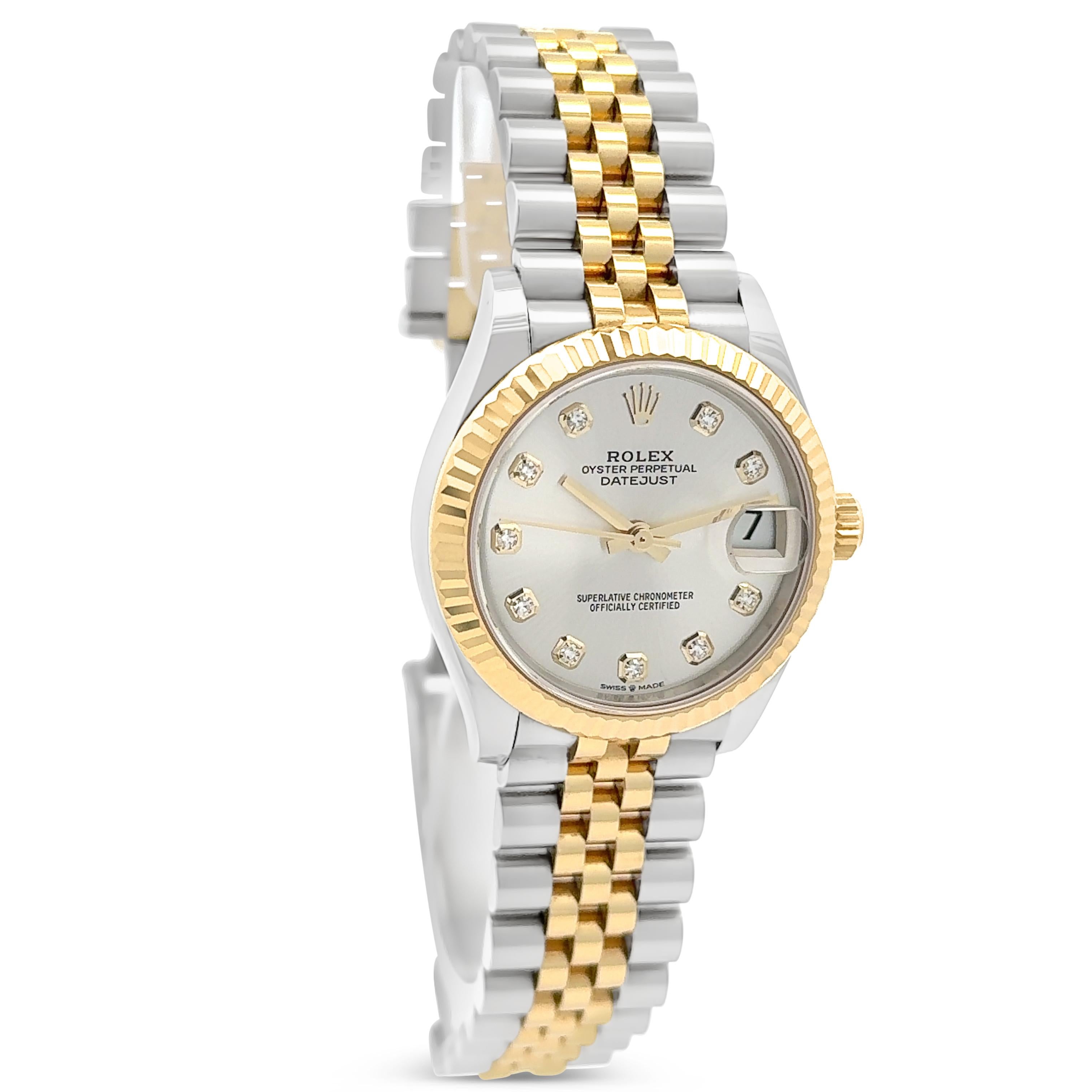 A classic Rolex wristwatch from the Oyster Perpetual Datejust collection, showcasing a silver dial with 10 round cut diamonds, each set in a four prong setting, representing hours. The band features the famous Jubilee design with links made of