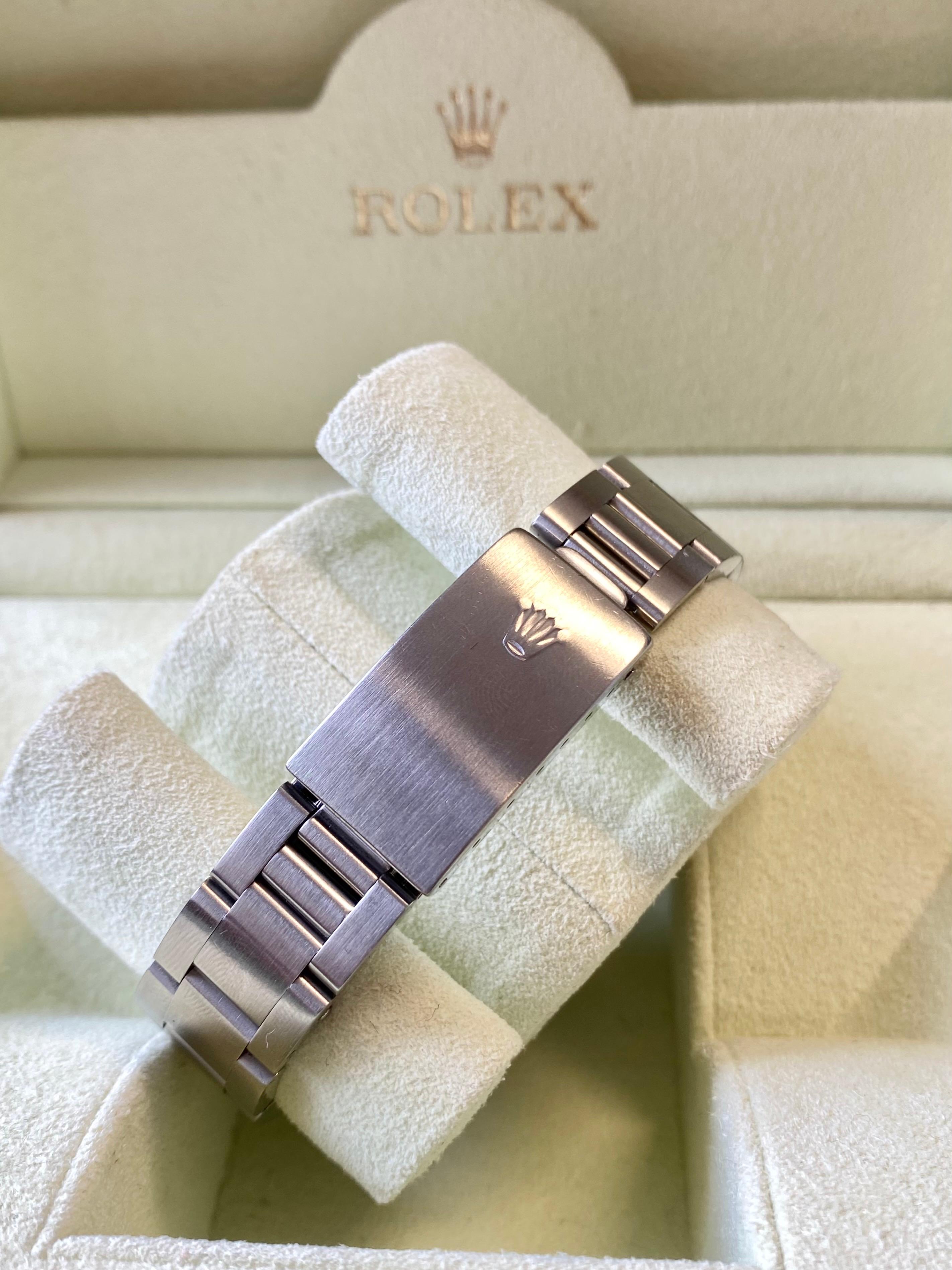 Rolex Montre Perpetual Date avec cadran blanc et bracelet Oyster Unisexe en vente