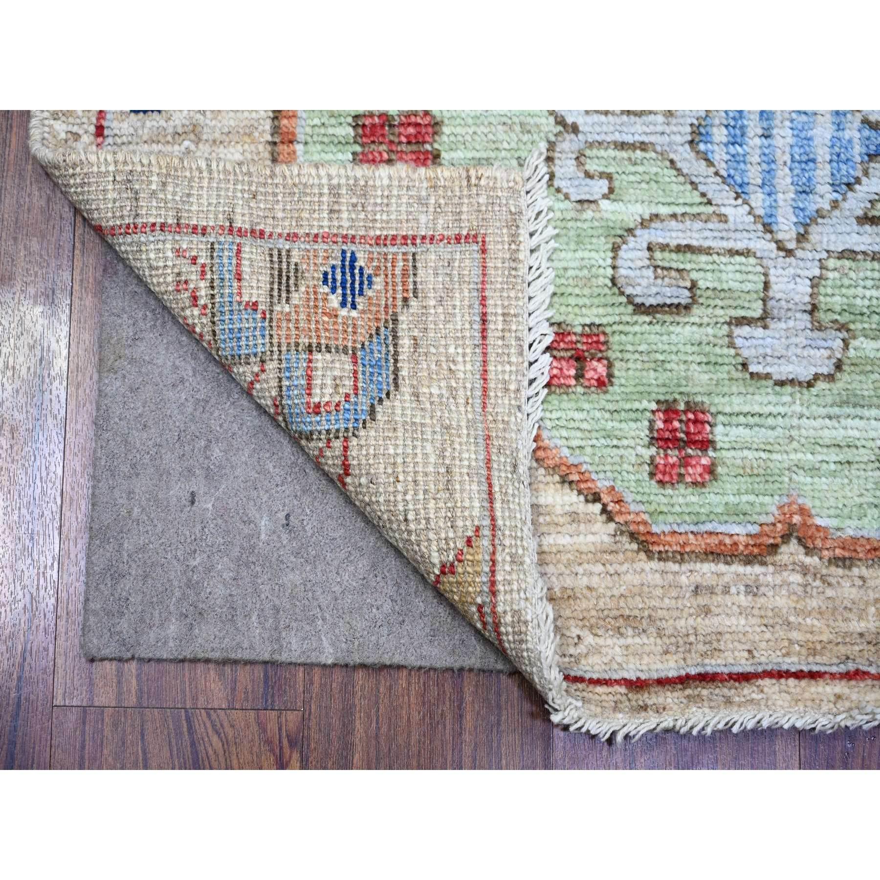 Tan Color, Anatolian Village Inspired with Large Design Elements and Bird Figurines Pure Wool Hand Knotted Oriental Runner Rug
Primary materials: Wool
Latex: No Pile 
height: 0.25 Inches
Style: Traditional
Primary color: Brown
Secondary colors: