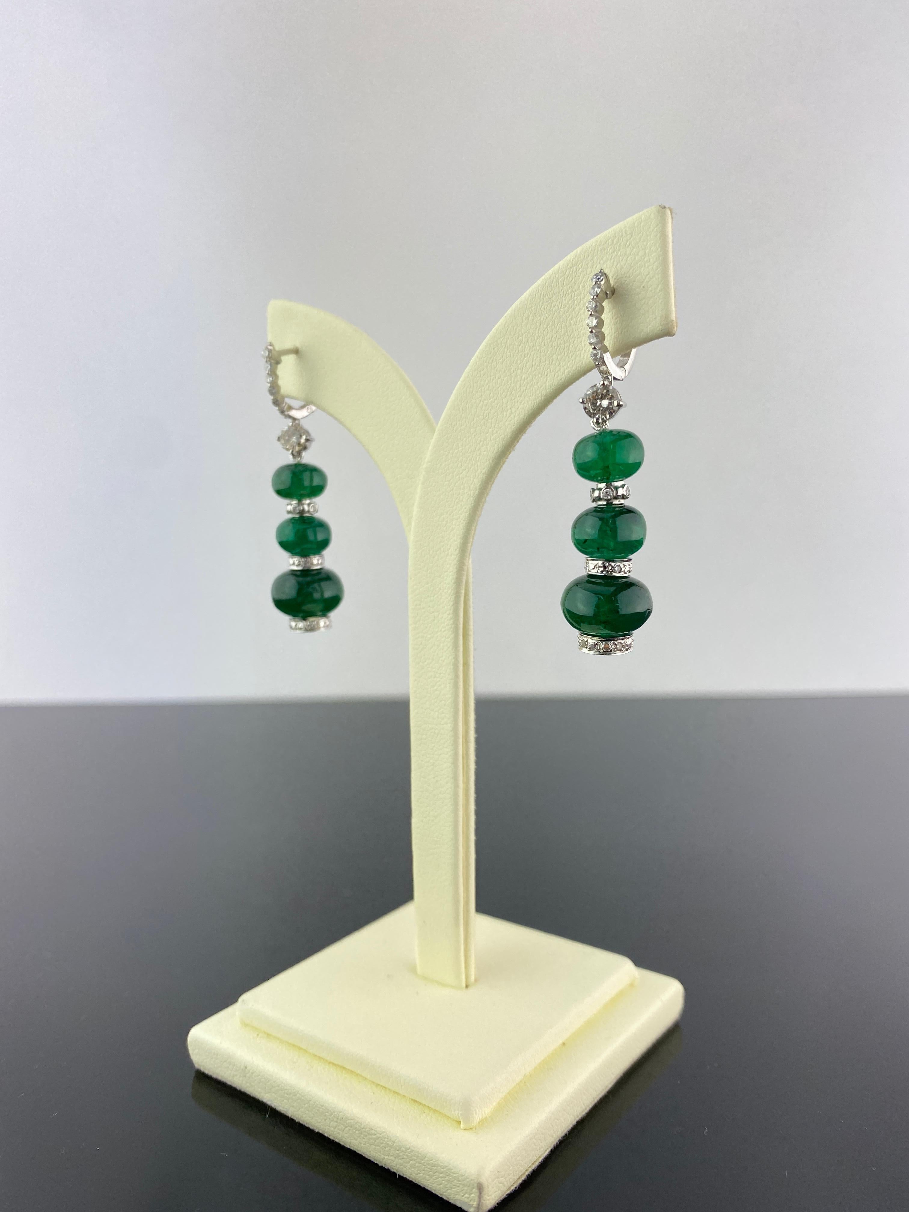 A pair of 32 carat Zambian Emerald beads earrings, transparent with few natural inclusions. These are a classic piece, with a modern touch - the quality of the emeralds speaks for itself! The emerald beads are absoluately natural, with no chemical