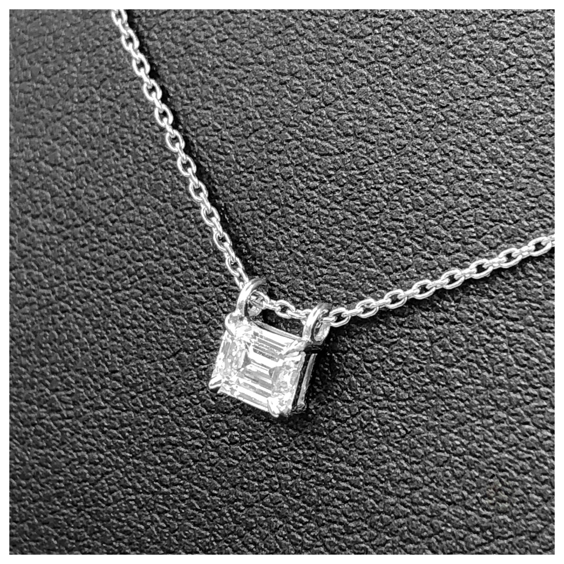 Beautiful and delicate emerald cut diamond .32 carat F color VS clarity slides and a simple 16 inch cable chain. 14 karat white gold.  If you don't see something, say something! We are a custom jewelry manufacturer in the heart of the Diamond