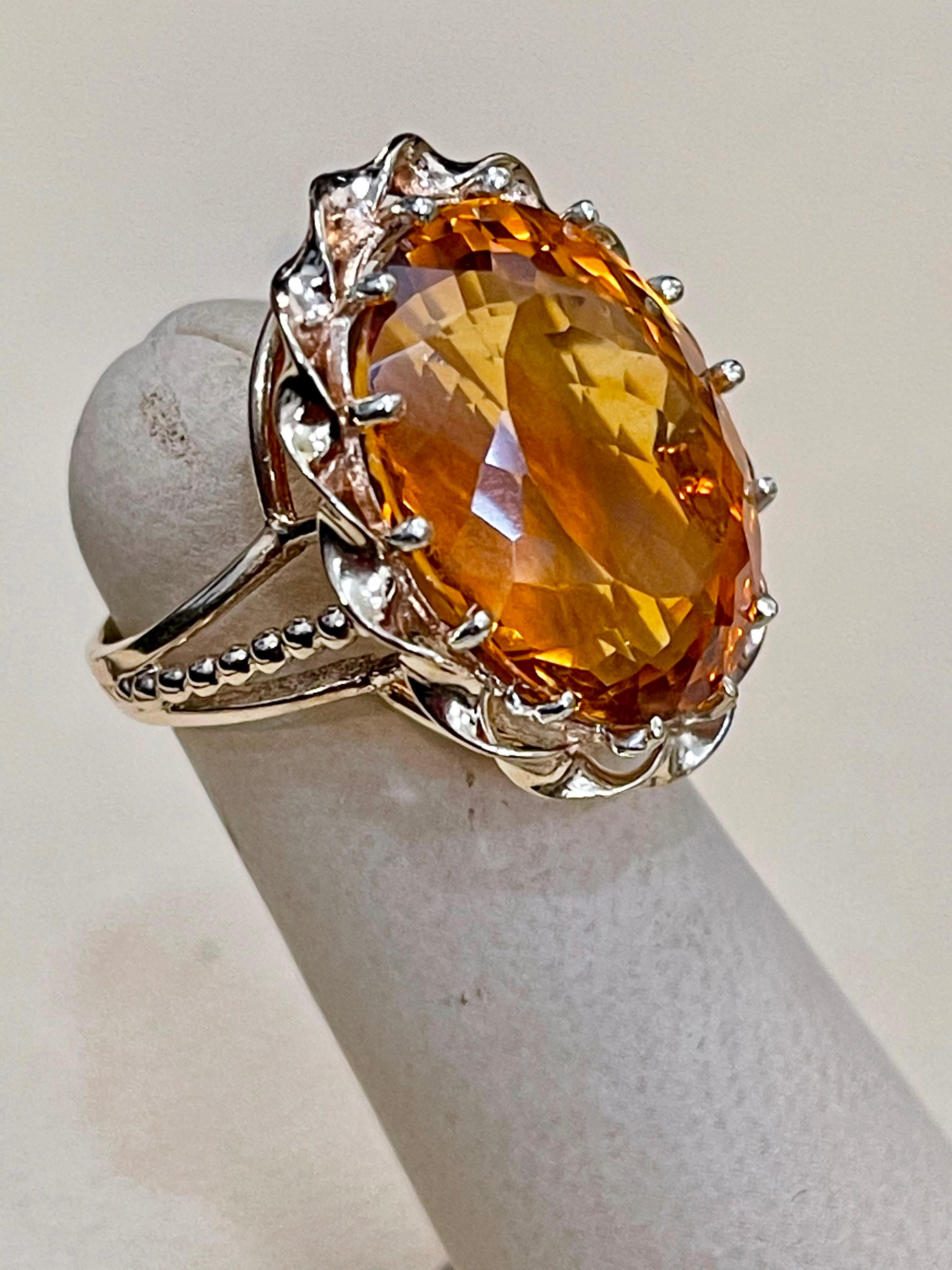 Approximately 32 Carat Natural Oval Citrine Cocktail  Ring in 14 Karat Yellow Gold, Estate 

This is a ring which has a  approximately 32 carat of high quality Citrine stone. The stone is 17.5 X 22 MM and 11 mm Deep
Color and clarity is very nice.
