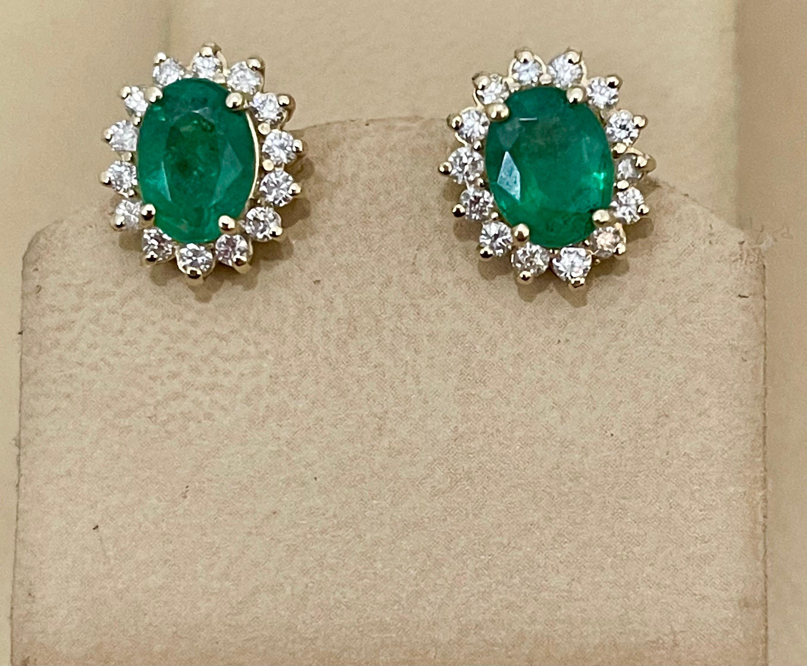 
Approximately 4 Carat Oval Shape Natural Emerald & Diamond Post Back Earrings 14 Karat Yellow  Gold
Two emerald weighing approximately  4 carats Total.

Origin Brazil
Very very fine Quality of   emeralds , Beautiful color and clarity with
