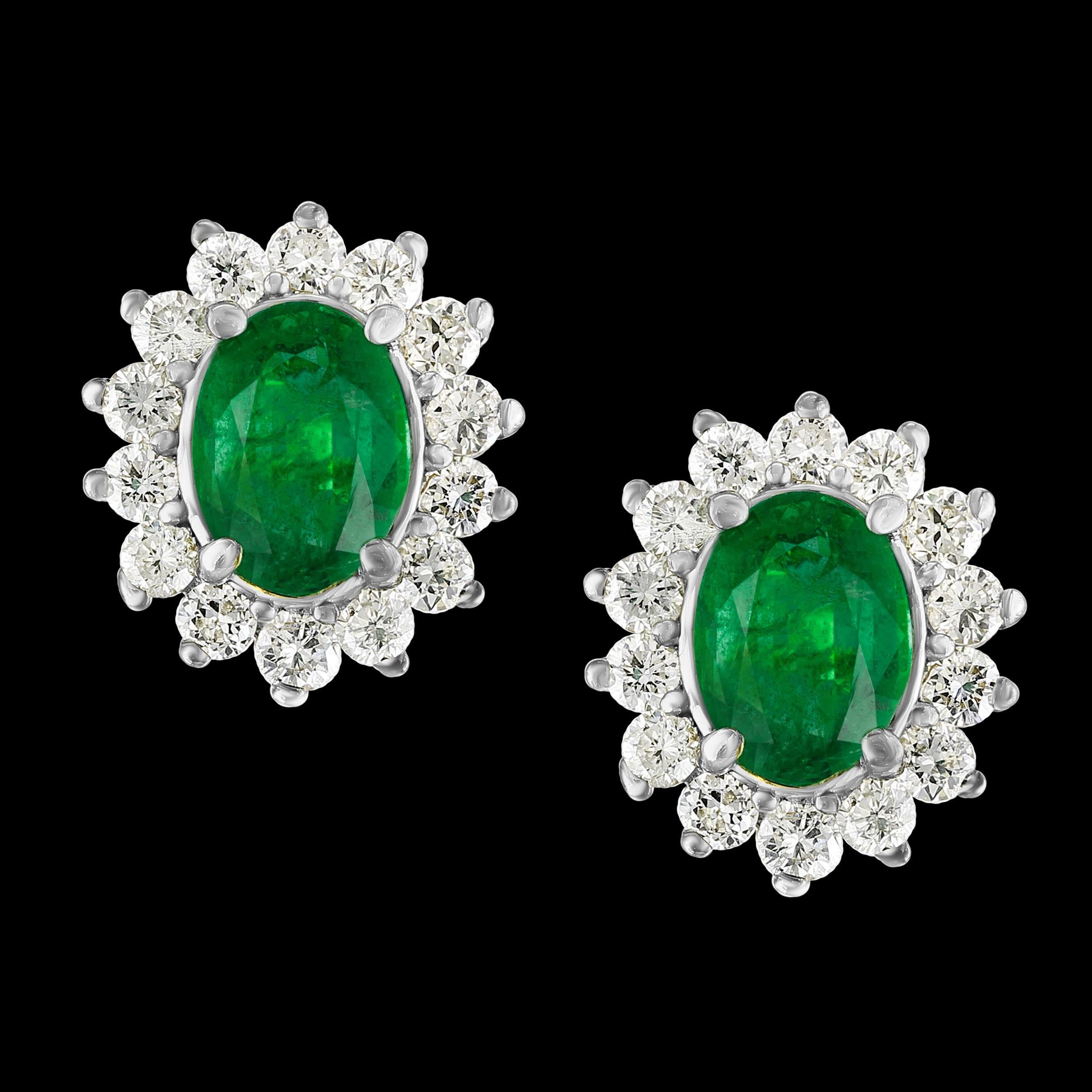 4 Carat Oval Shape Emerald and Diamond Post Back Earrings 14 Karat Yellow Gold 12