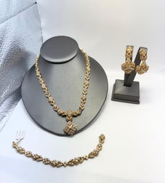 32 carats Diamond set necklace, earrings and bracelet set 18KT gold