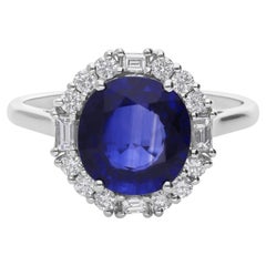 3.2 Ct Blue Sapphire 0.38 Ct Diamond Halo Engagement Ring 18 Karat White Gold