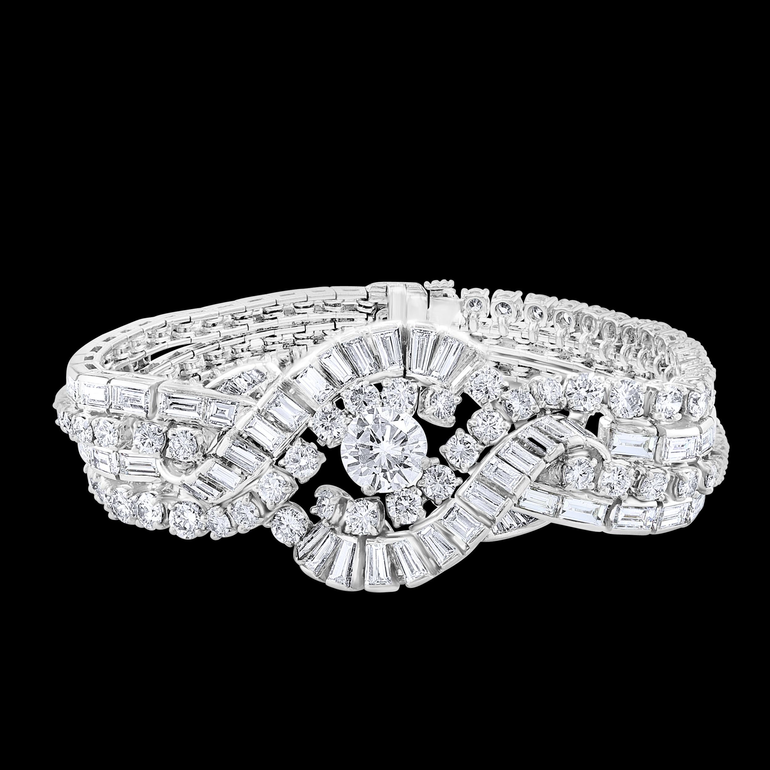 An Art Deco  Bracelet has a center Round shape solitaire diamond 1.79 ct , GIA Certified 
Total Carat weight is approximately 32 ct
Platinum 82 grams
Large size baguettes and brilliant cut round diamonds 
Its classy design and lustrous décor is