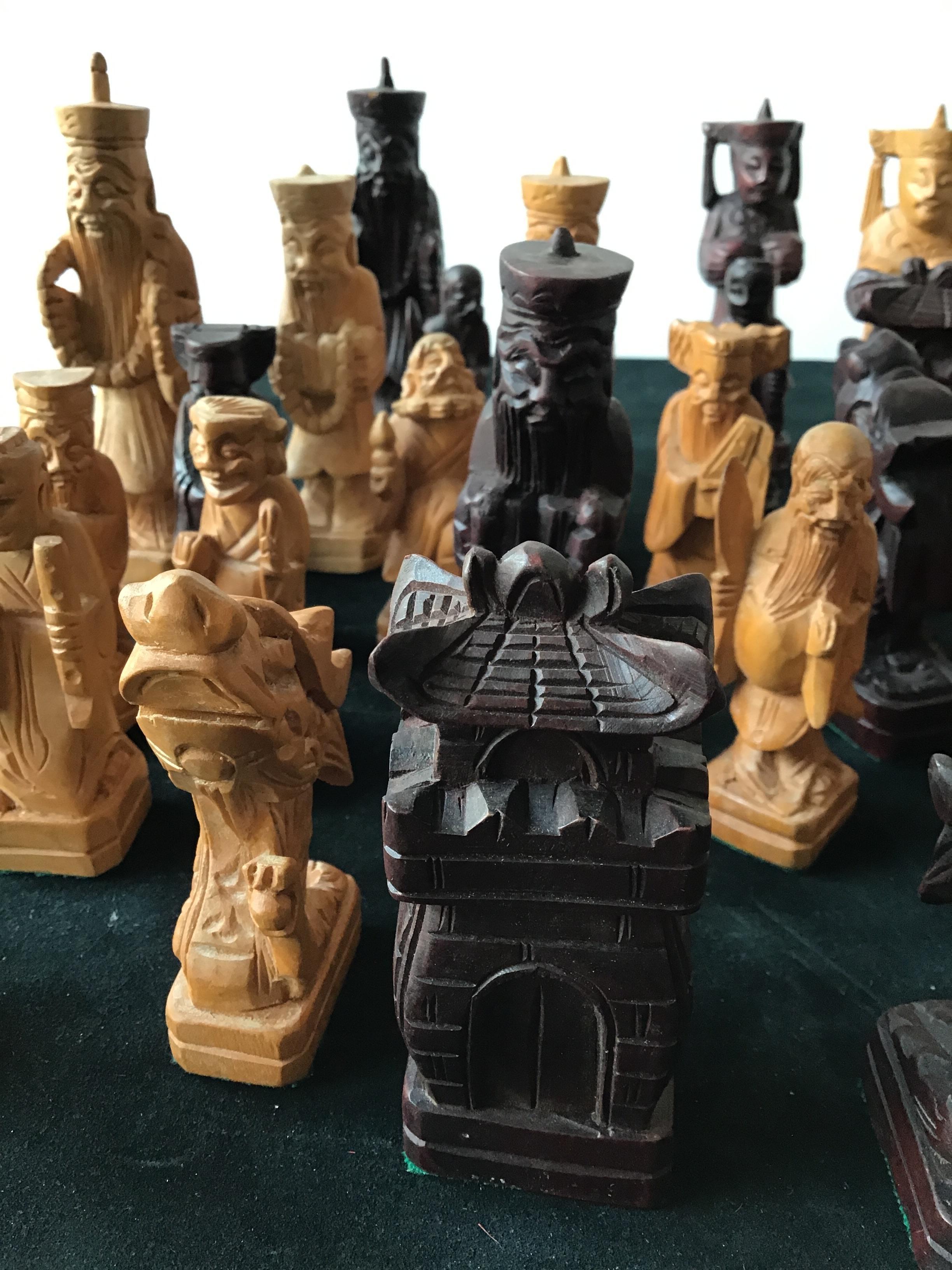 32 hand carved wooden Asian chess pieces.