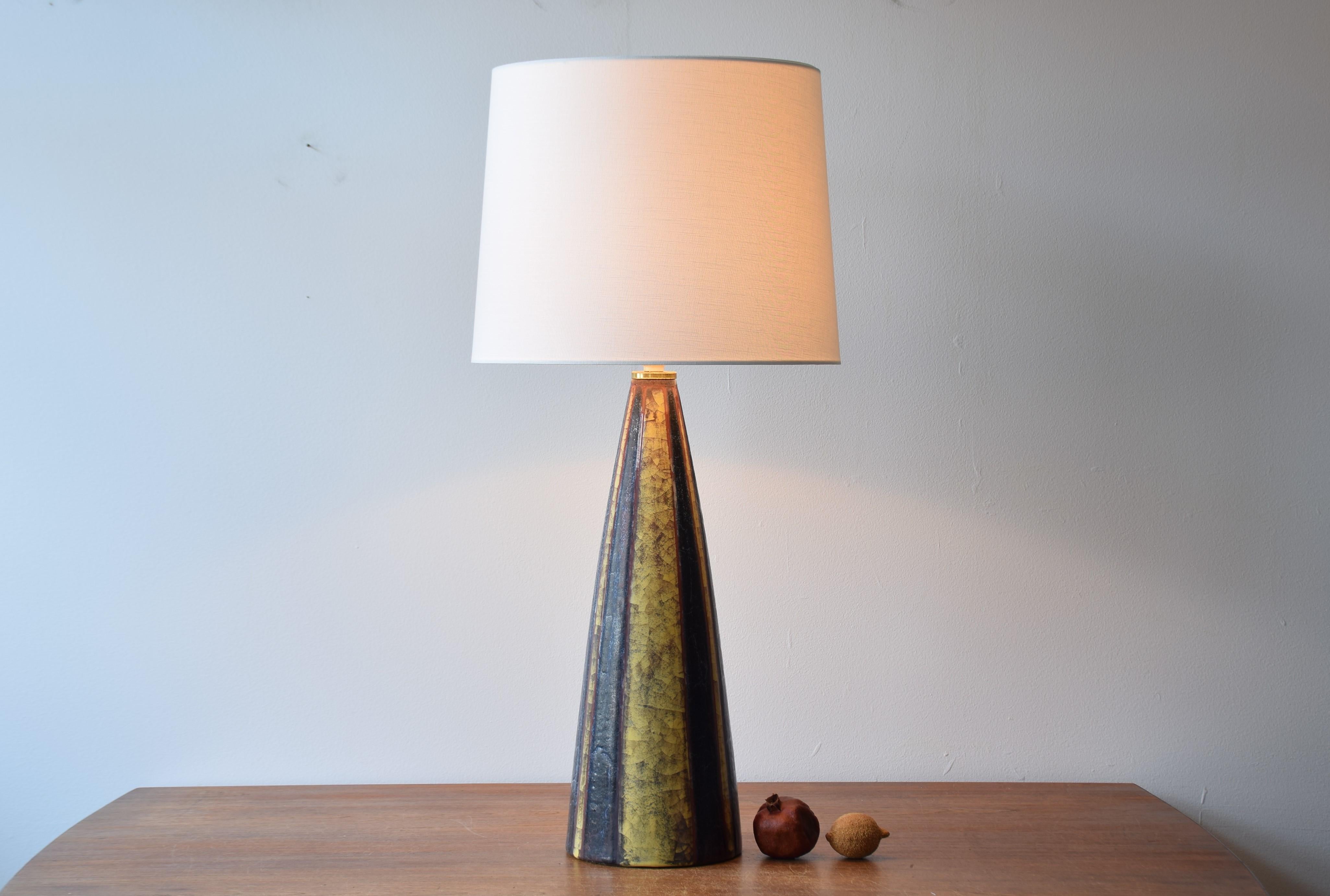 Stunning and very tall mid-century Danish table lamp from the ceramic workshop Michael Andersen & Søn on the Danish island Bornholm. Made ca 1960s. This lamp can also be used as a floor lamp.
The lamp is most likely a one-of-a-kind piece.

The lamp