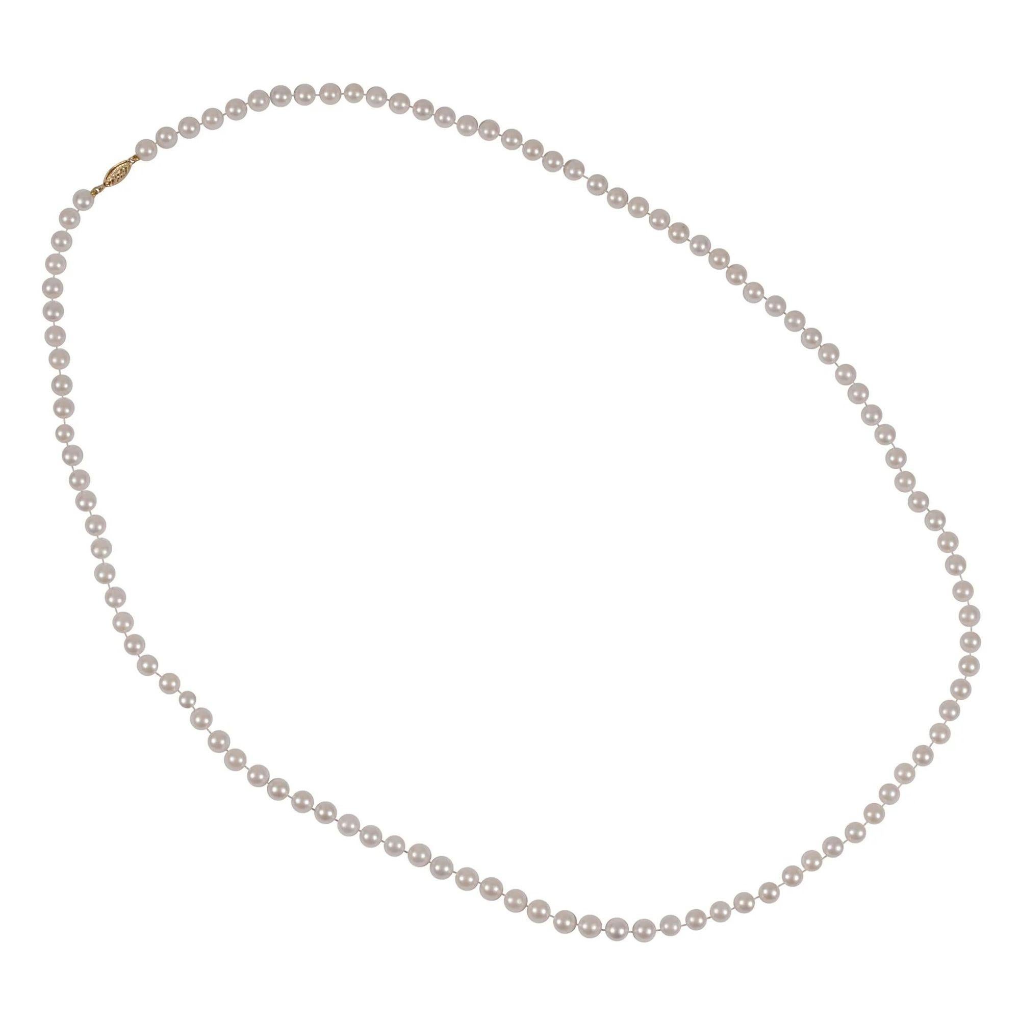 Estate 32 inch cultured pearl necklace. This necklace features cultured pearls measuring 6.5-7mm. The pearl necklace has a 14 karat yellow gold clasp. [SJ SAUC9097 P]

Dimensions
32″L