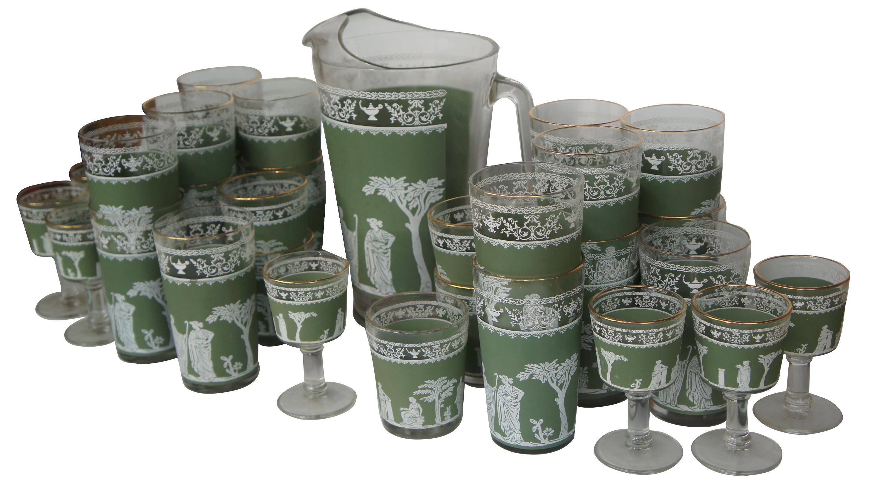 Lot of 32 pieces of Jeanettee Wedgwood, circa mid 20th century. A great cocktail set or addition to current barware. Green and white with grecian or hellenic pattern.

pitcher-8