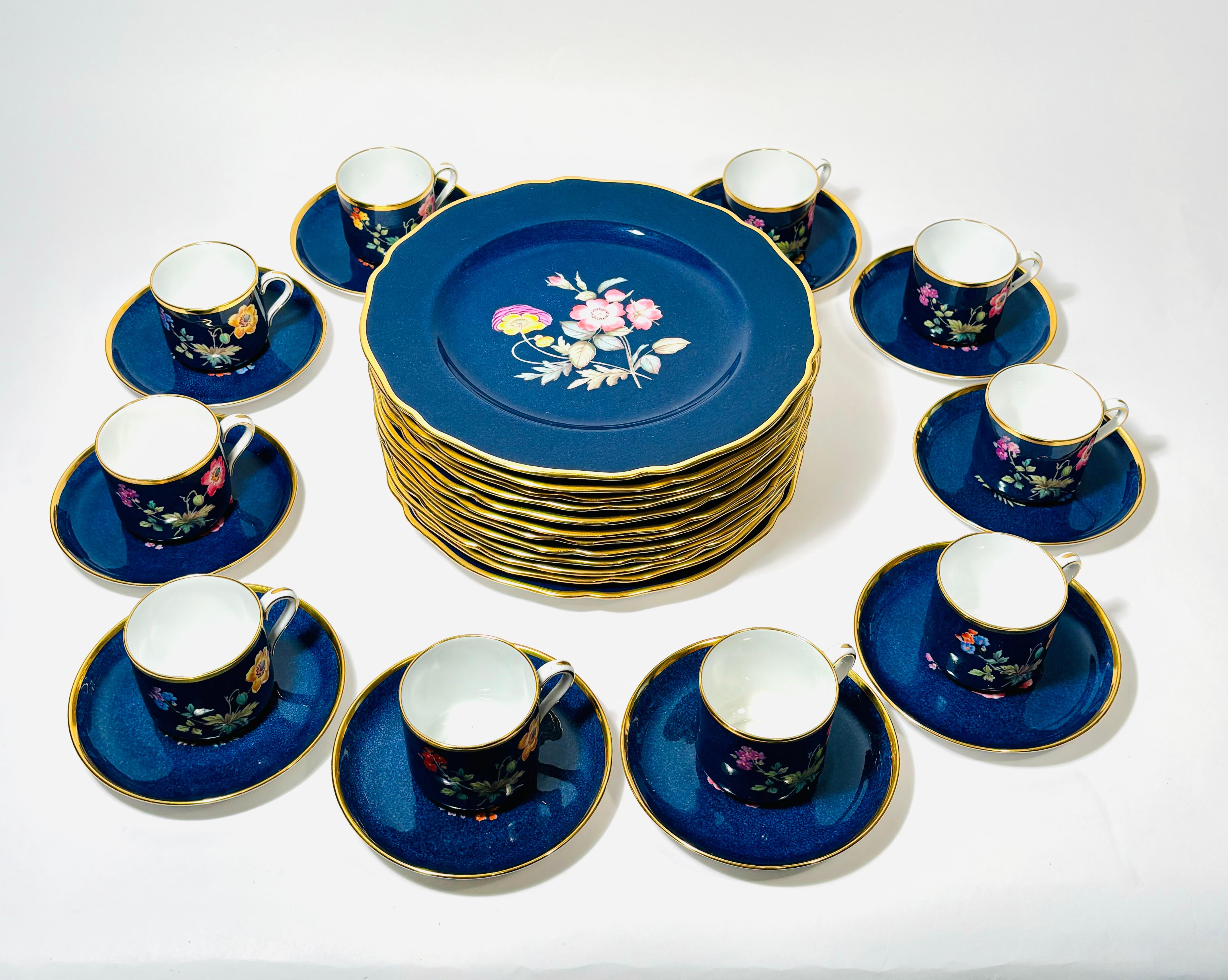 From one of our favorite English firms, Copeland Spode, is this striking set. The rich almost cobalt blue background is textured and inset with vibrant florals. Each one is different and labeled in Latin on the back of the plate. A pretty scallop