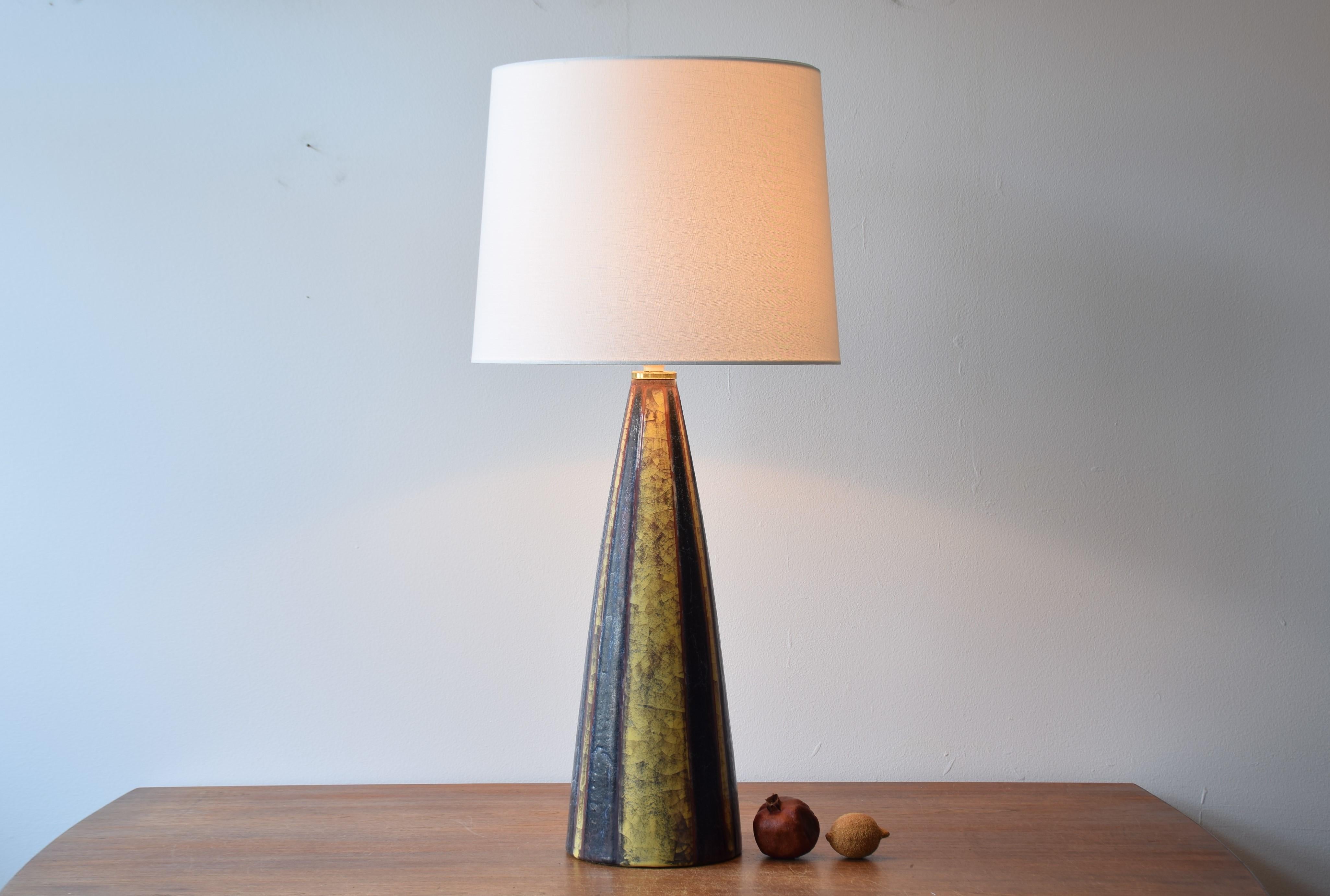 Stunning and very tall mid-century Danish table lamp from the ceramic workshop Michael Andersen & Søn on the Danish island Bornholm. Made ca 1960s. This lamp can also be used as a floor lamp.
The lamp is most likely a one-of-a-kind piece.

The