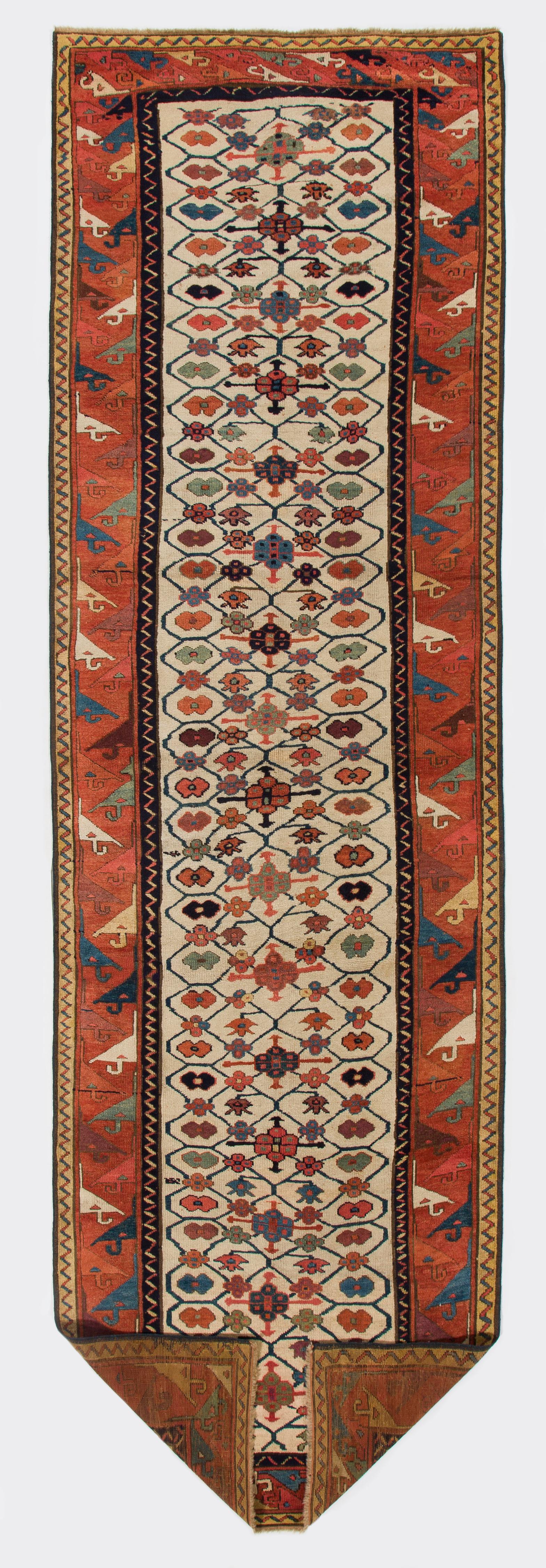 An extremely rare and early Caucasian Moghan Kazak runner for a museum or serious collection of antique Caucasian rugs. Good condition, original as found in the UK. 

3'2'' x 10'6''.