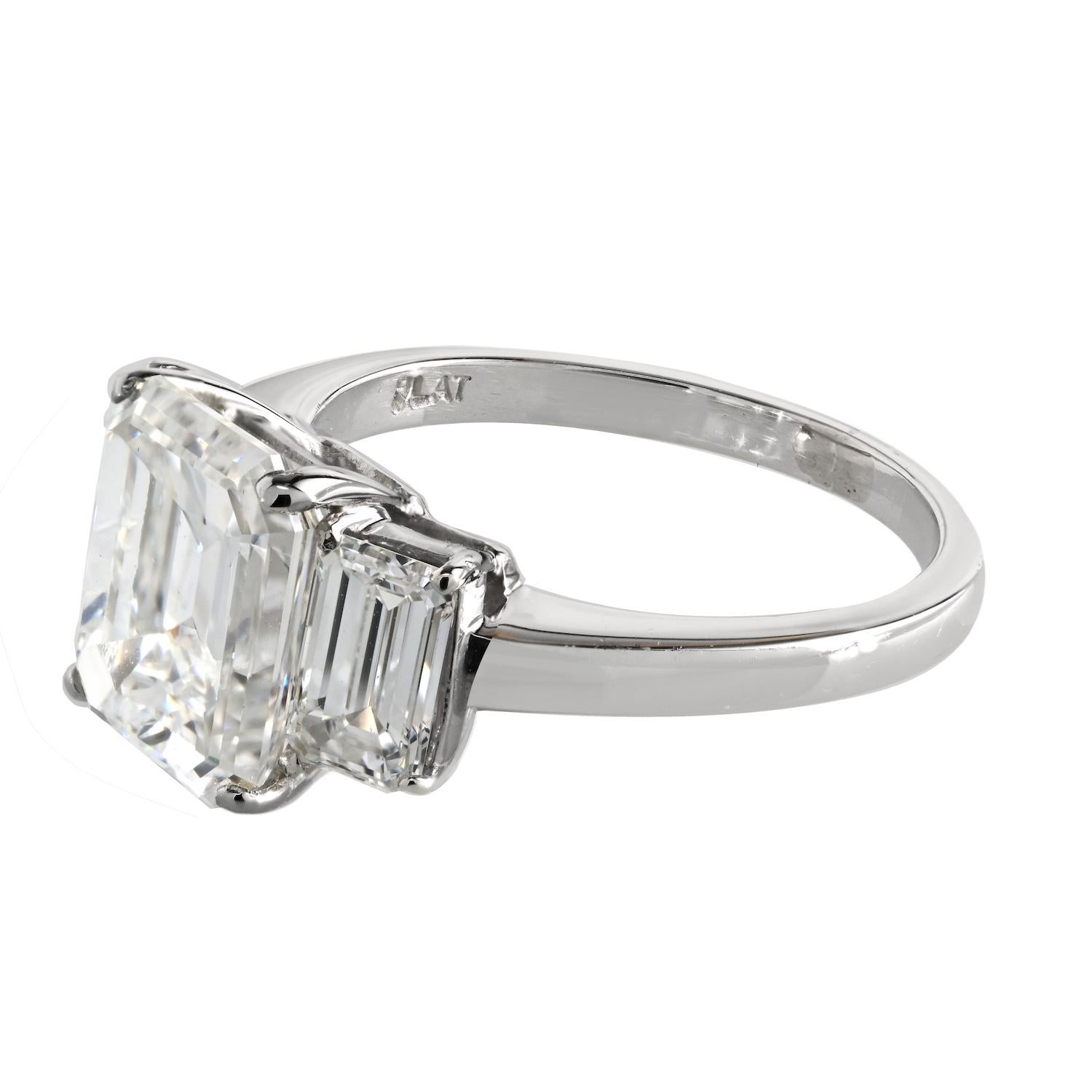 Modern 3.20 Carat Emerald Cut Diamond F/VS1 Three Stone Engagement Ring For Sale