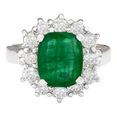 Bague en or blanc 14 carats avec diamant émeraude