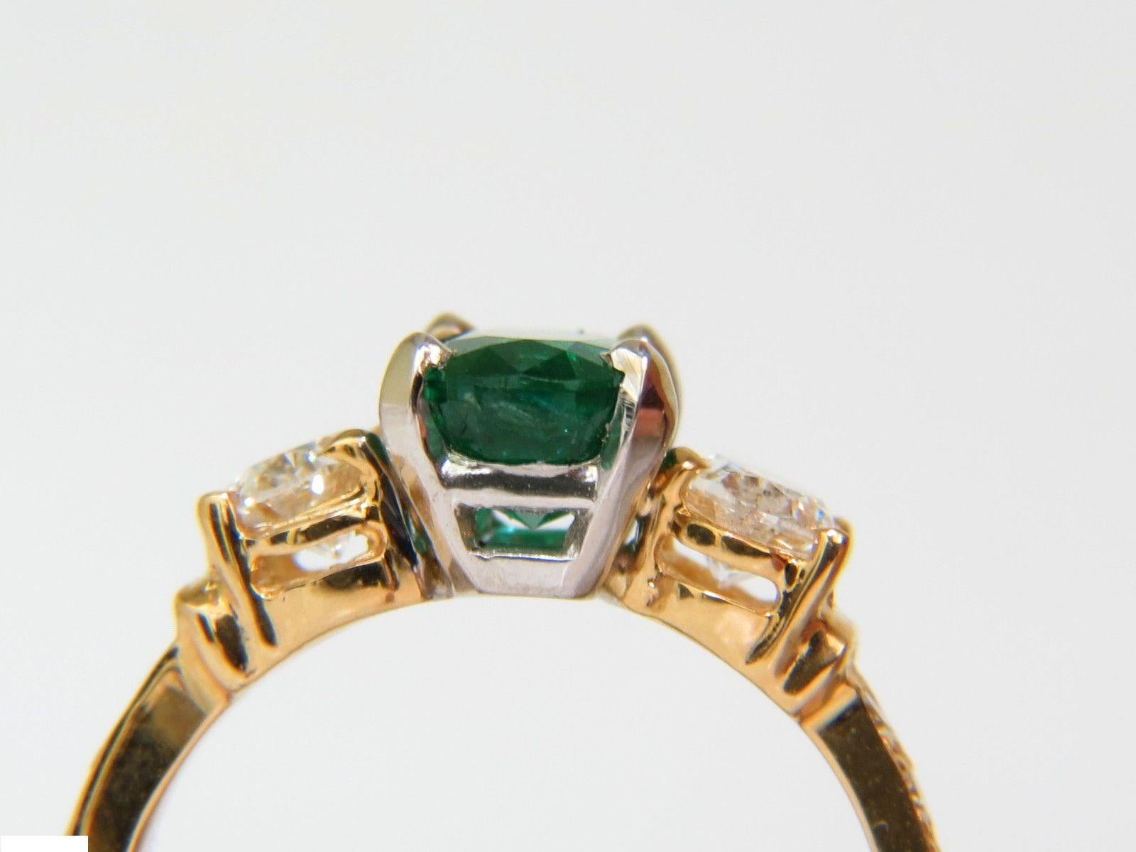 Early European Deco

Three stone classic

1.60ct. Natural Oval emerald

Vivid Green, Excellent Saturation 

Clean clarity / very slightly included

Zambia mining at its best! 

 

1.60ct. diamonds

Includes the weight of 2 ovals and side round pave