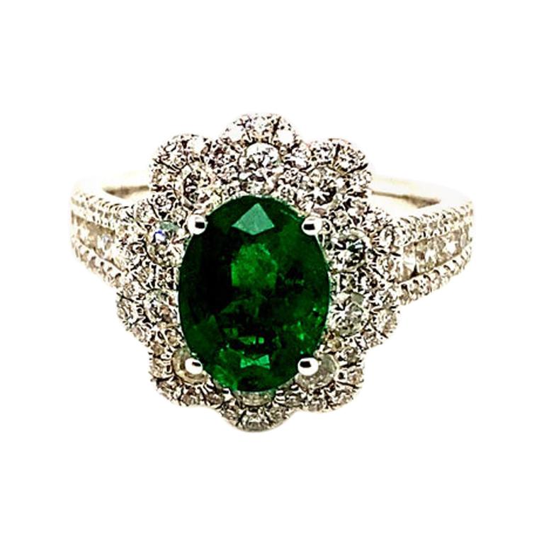 3.20 Carat Natural Oval Emerald and Diamond Ring 18 Karat White Gold For Sale