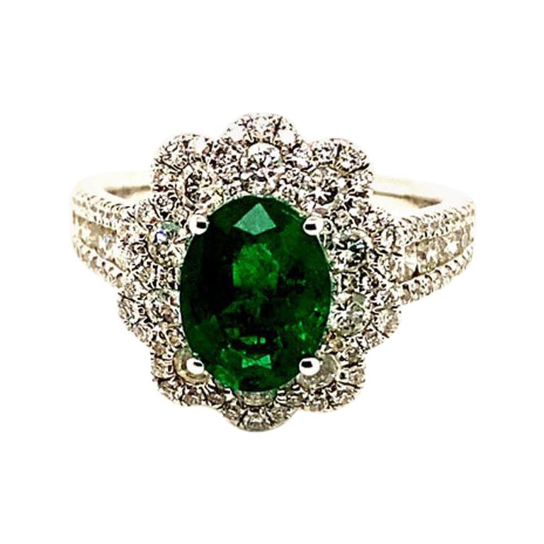 For Sale:  3.20 Carat Natural Oval Emerald and Diamond Ring 18 Karat White Gold