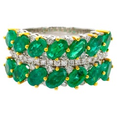 3.20 Carat Oval Cut Emerald and Round Diamond Band Ring in 18k Two-Tone Gold